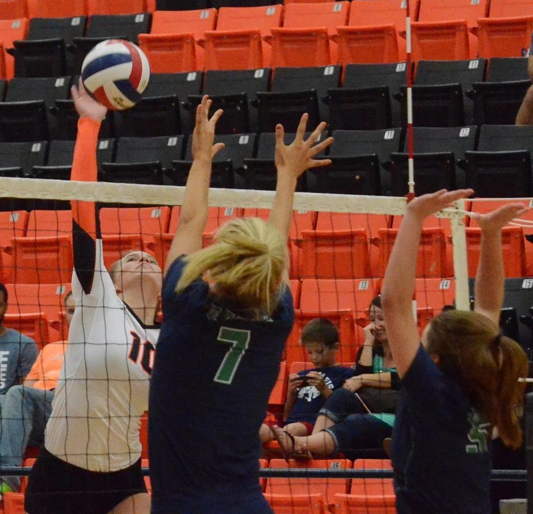 Ladycats junior hitter Sydney Casey (10) sends down a kill during Aledo's win over Eaton. The Ladycats will continue District 6-5A volleyball action at 6:30 p.m. today at Brewer.