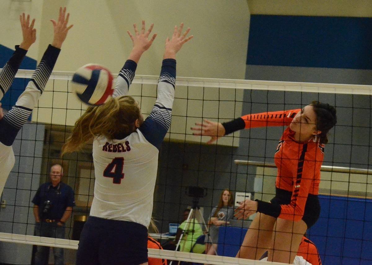Aledo senior hitter Maddie Goings (13) sends down one of her 18 match-high kills Tuesday night during the Ladycats' 25-15, 25-9, 25-19 victory over Richland in a Class 5A area championship match at Brewer High School. The win advances state-ranked No. 7 Aledo to the regional quarrterfinals.