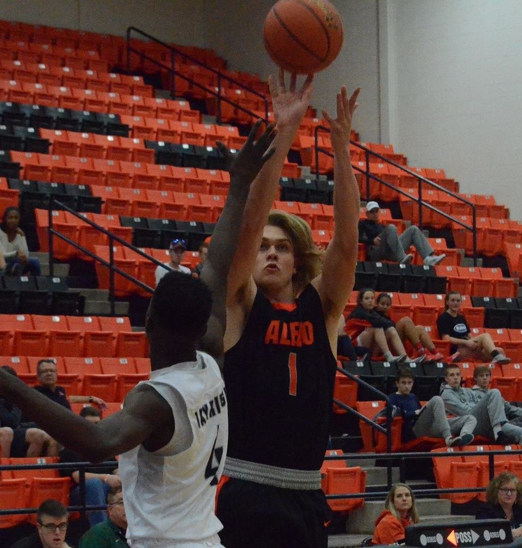 Aledo senior post Cam Caldwell lets a jumper fly in the first quarter of the Bearcats' 42-41 loss to Arlington Oakridge Tuesday afternoon at the Moritz Holiday Classic at the Aledo High School gym. Caldwell finished with a game-high 19 points. Photos by Tony Eierdam.