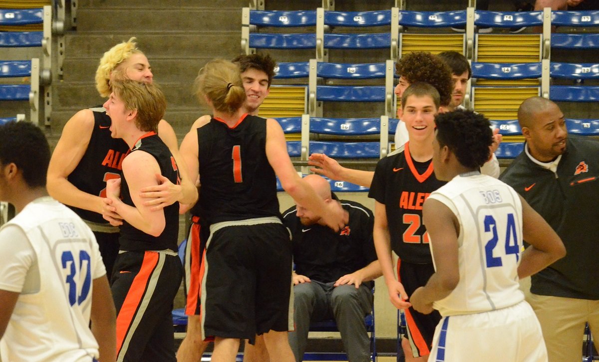 Aledo celebrates its double overtime win Tuesday at Boswell. The victory gives the Bearcats a one-game lead over the Pioneers for the final playoff spot in 6-5A with two games remaining. Photos by Tony Eierdam