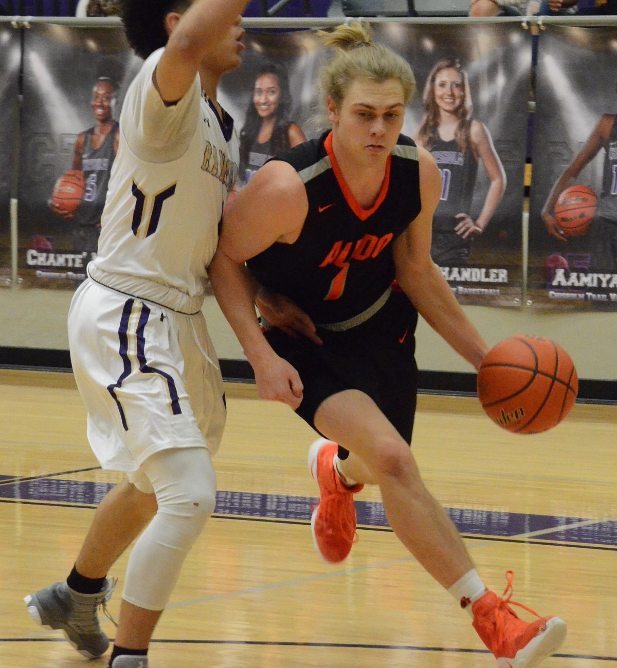 Aledo senior post Cam Caldwell drives the baseline Friday night during the Bearcats' loss at Chisholm Trail. Caldwell led the Bearcats with 11 points. Photo by Tony Eierdam