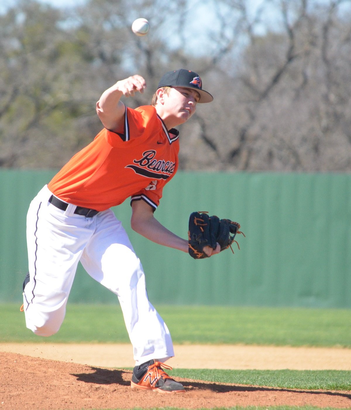 Aledo junior pitcher Steven Swift opens the 2017 season with a fast ball Thursday afternoon at the AHS baseball field in the opening game of the Southwest Ford Classic. The Bearcats defeated Birdville, 7-6. The Bearcats will continue tournament play at 6 p.m. today at home against Ennis. Photo by Tony Eierdam