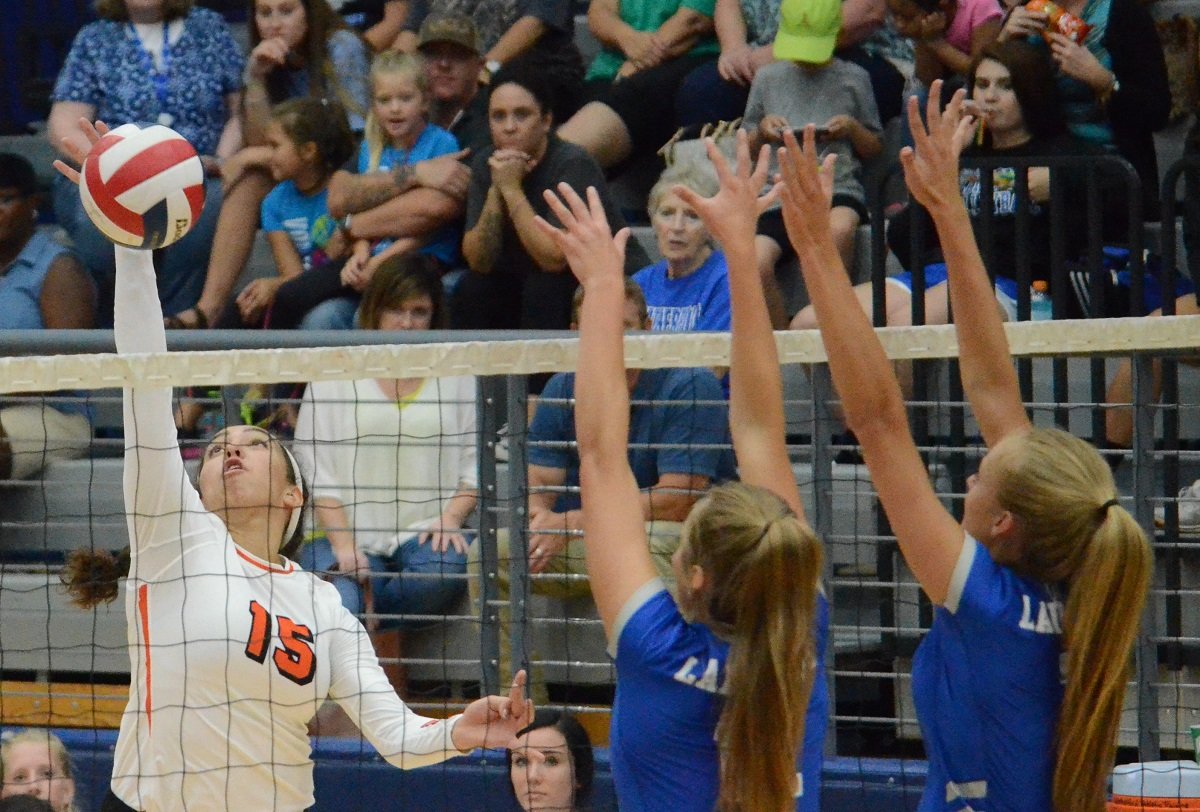 Aledo outside hitter Evelyn Torres (15) sends down one of her team-high nine kills Tuesday night during the Ladycats' loss at Weatherford. Photo by Tony Eierdam