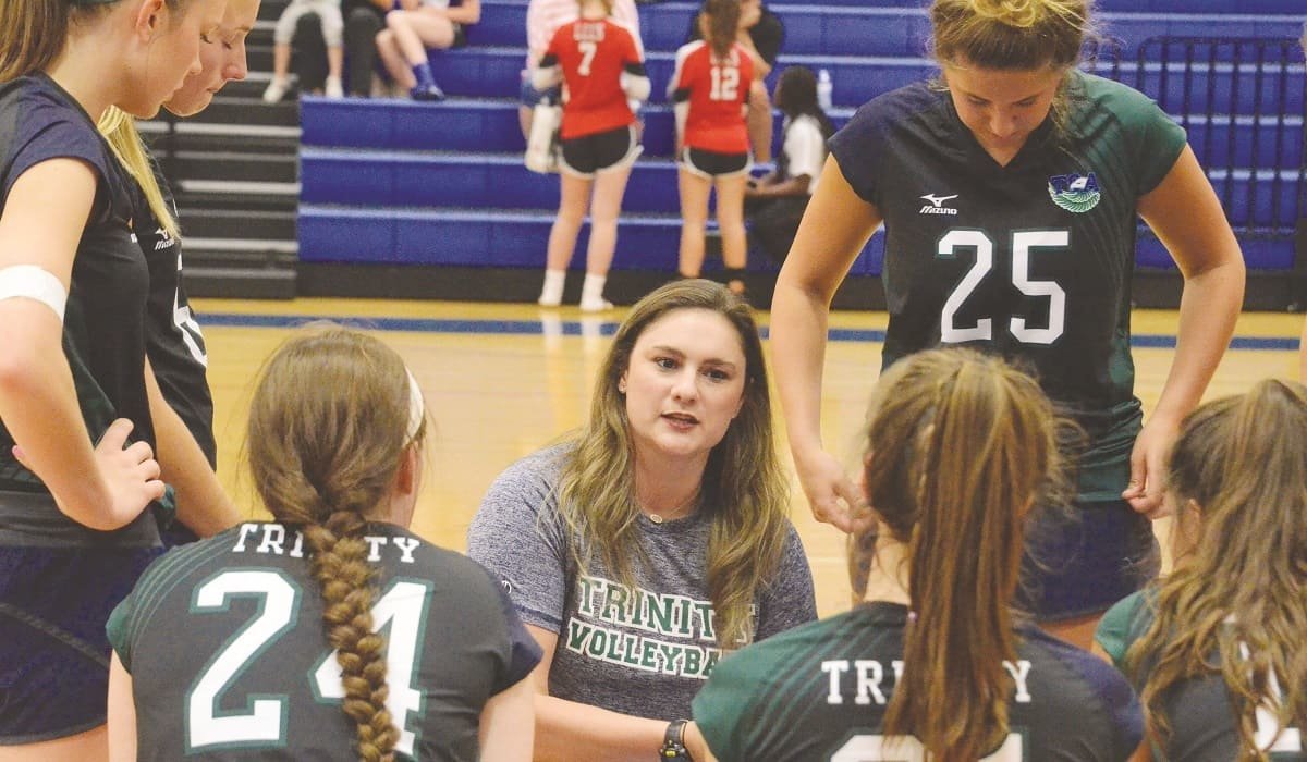 New Trinity Christian Academy head volleyball coach Brittany Good talks to the Lady Eagles during a timeout in a recent match. The Lady Eagles will begin TCA Summer Slam Invitational Volleyball Tournament play at 11 a.m. Thursday at Barber Gym. Photo by Tony Eierdam