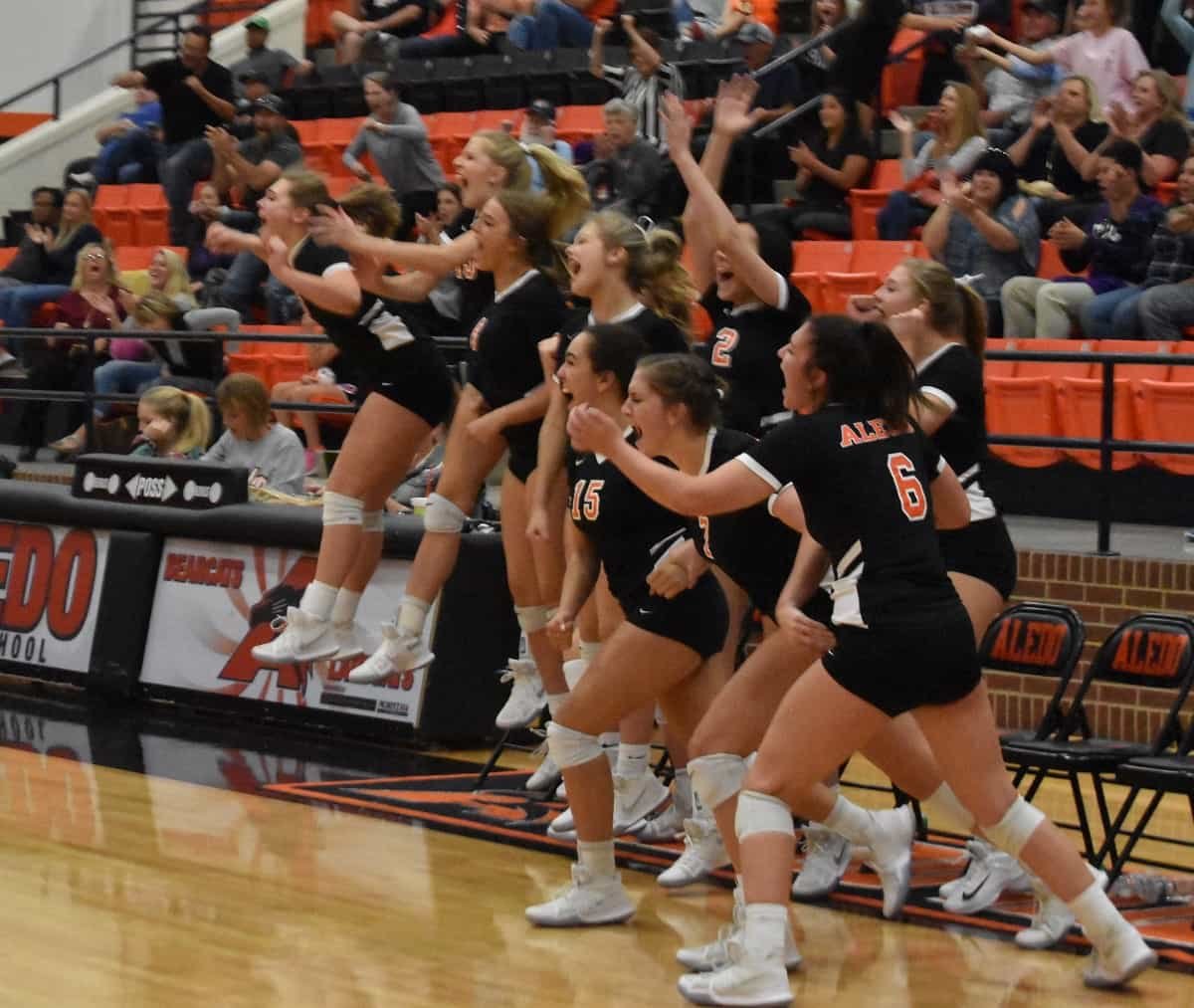 The Ladycats celebrate moments after sweeping Boswell Tuesday night at Aledo. The Ladycats' win ties Aledo and Boswell for first place in District 6-5A. Photos by Tony Eierdam