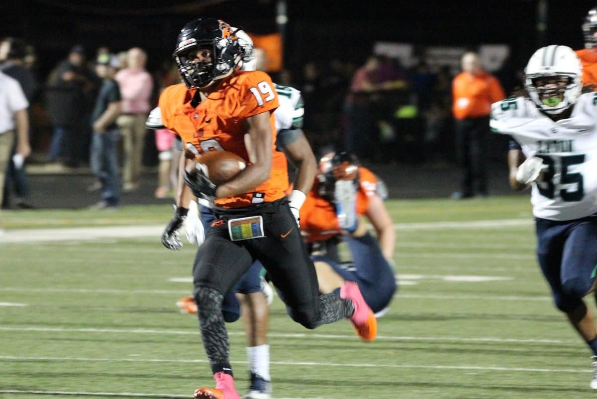 Aledo junior tailback Tre Owens scores one of his three touchdowns during the Bearcats' 52-13 victory over Eaton Friday night at Bearcat Stadium. Owens finished with a game-high 257 yards rushing. Photo by Karen Towery