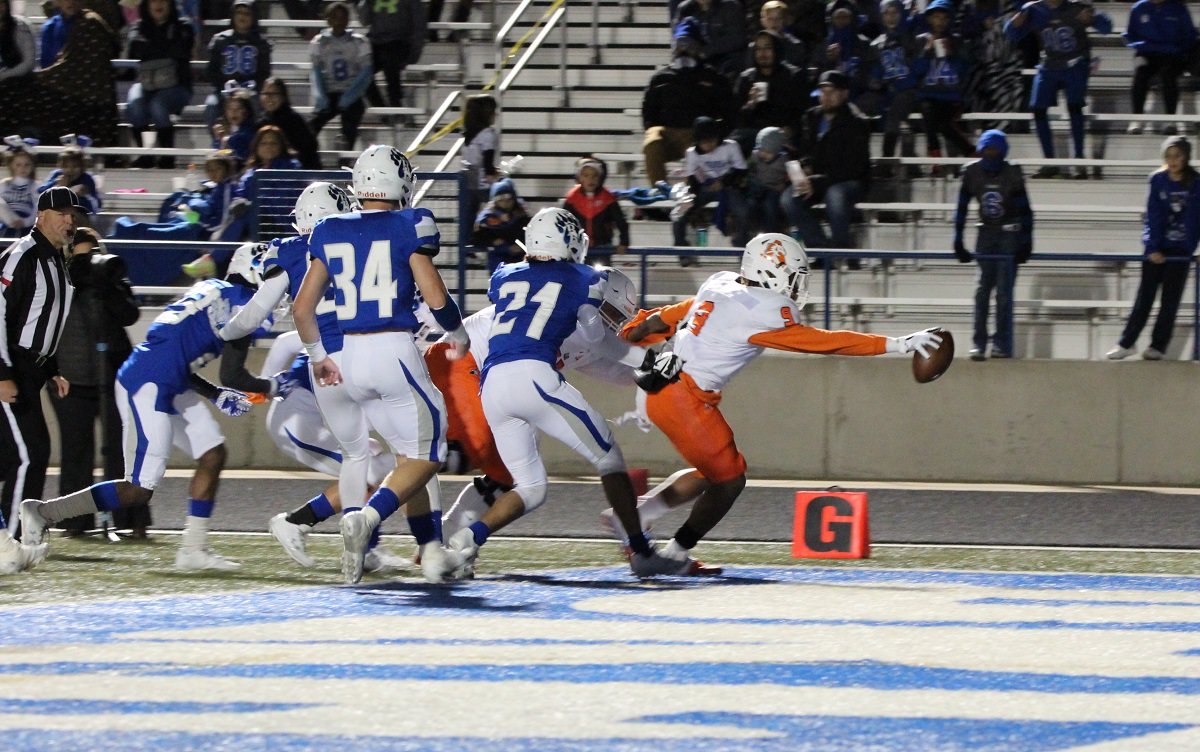 Aledo sophomore tailback Jase McClellan (9) scores the second of his three touchdowns Friday night during the Bearcats' 59-7 win at Brewer. McClellan was making his first appearance since a wrist injury sidelined him before district play. Photo by Karen Towery