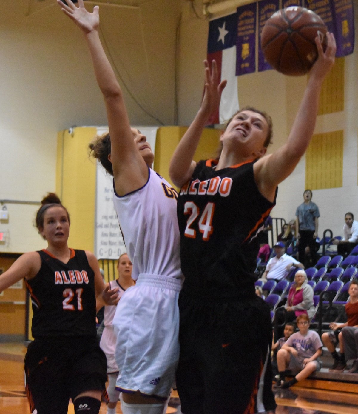 Aledo junior guard Reagan Brown aggressively drives to the basket during the Ladycats' 37-23 victory over Godley Tuesday night at Godley. Photo by Tony Eierdam