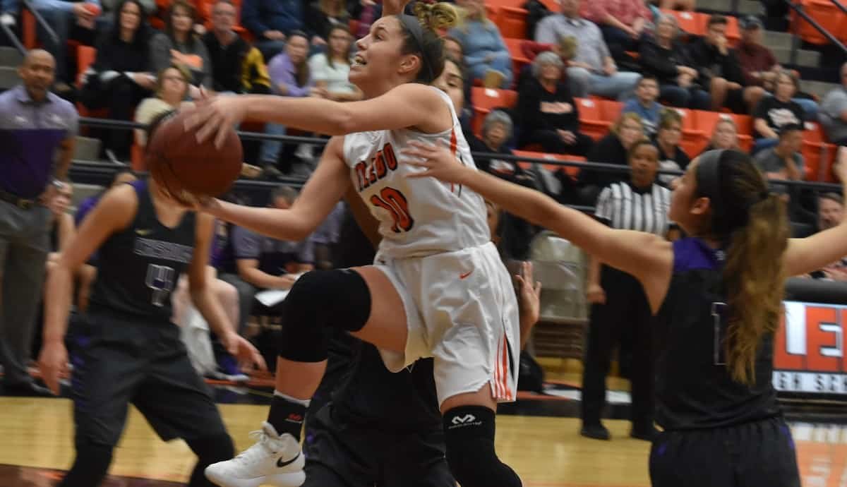 Aledo guard Taylor Morgan flies to the hoop on her way to scoring two of her game-high 20 points during the Ladycats' 49-43 win over Chisholm Trail. Photos by Tony Eierdam