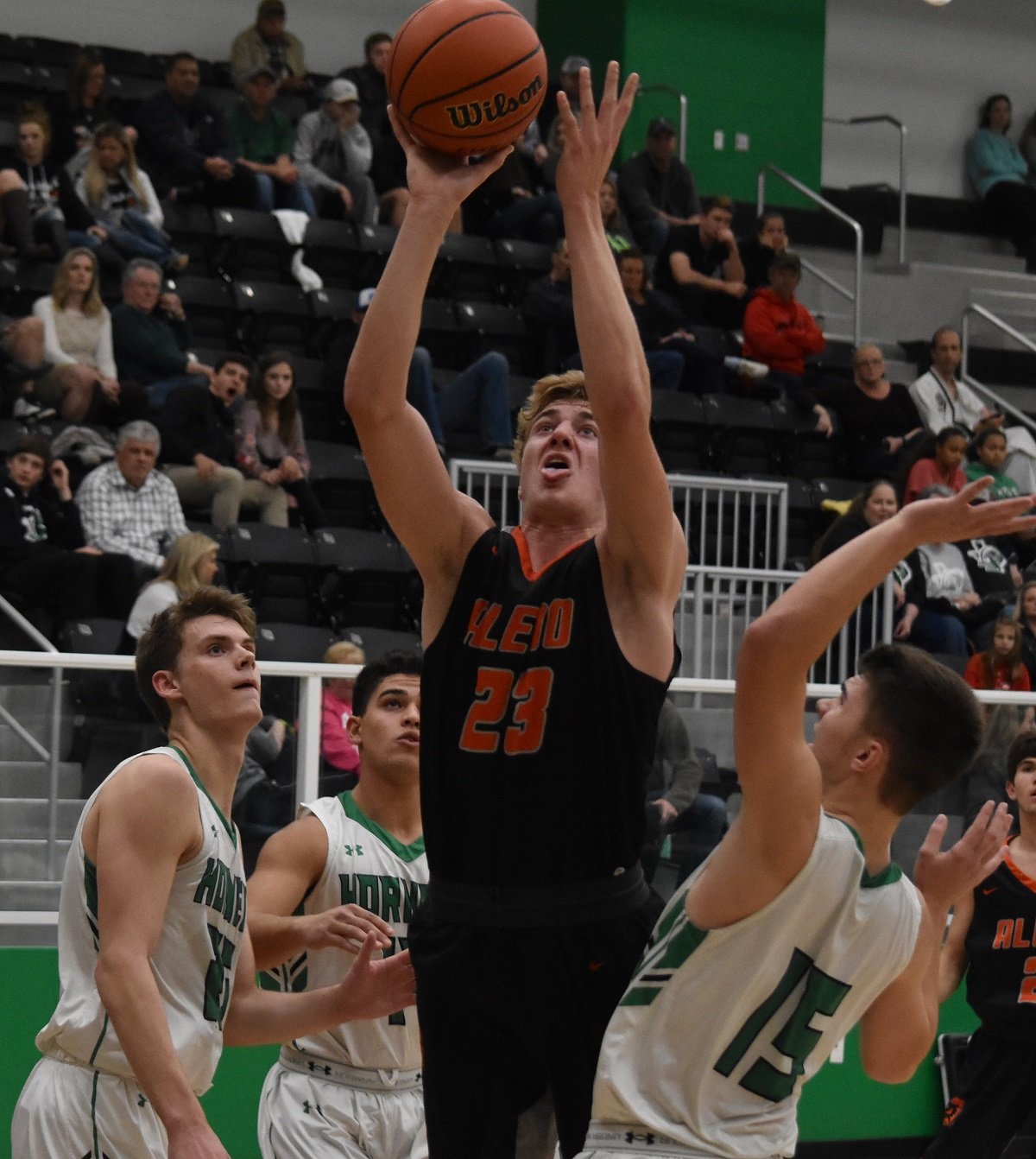 Aledo post Ayden Smith (23) goes up strong for a layup during the Bearcats' win at Azle. Smith finished with a game-high 22 points and nine rebounds. Photos by Tony Eierdam
