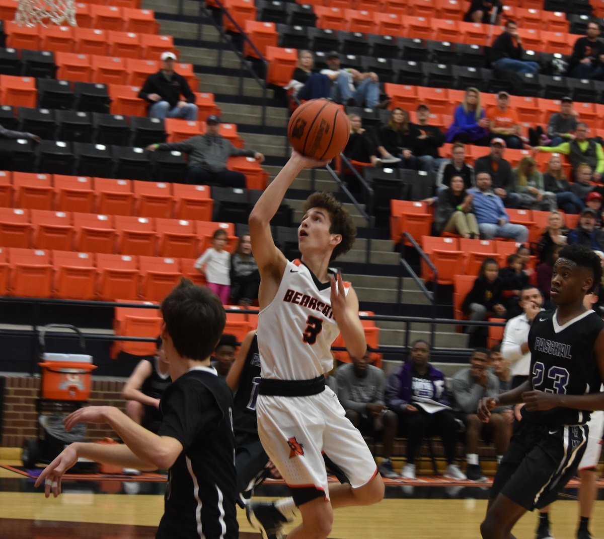 Aledo senior guard Leo Bell drives to the basket Thursday night during the Bearcats' 52-49 loss to Paschal. Photo by Tony Eierdam