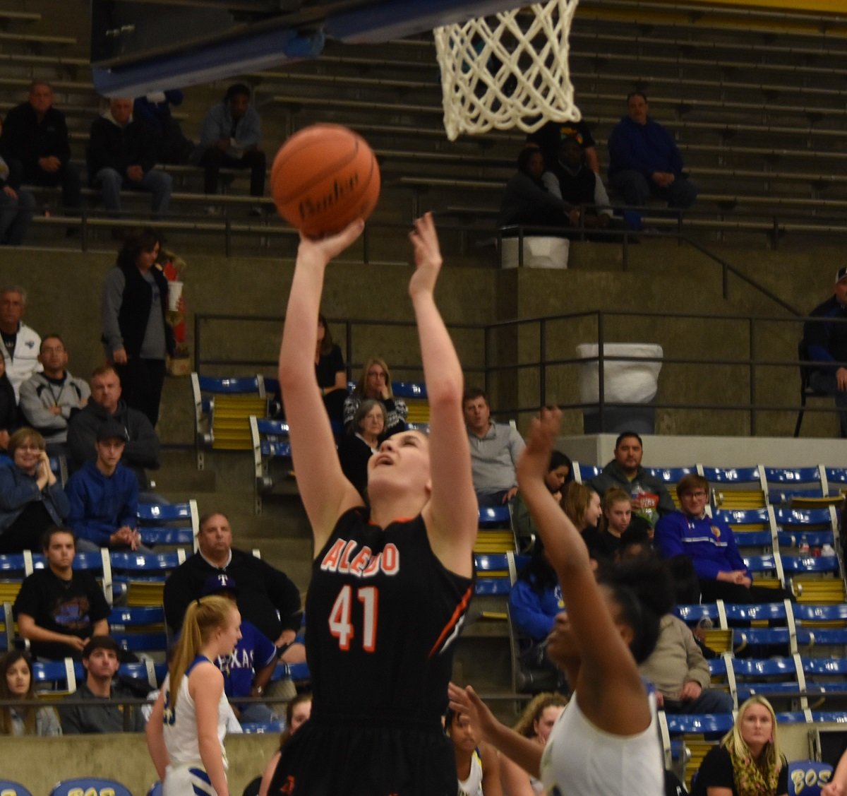Aledo post Sarah Haeussler drives in for a layup Friday night during the Ladycats' loss at Boswell.