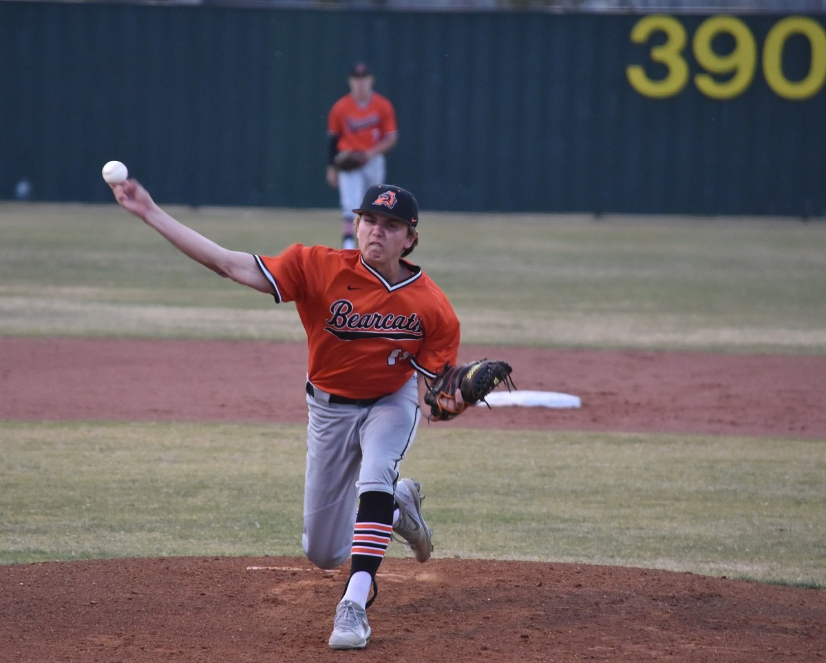 Aledo pitcher Steven Swift fires a fast ball to the plate during the first inning of the Bearcats' 12-0 win at Bowell in a District 6-5A game Tuesday night at Boswell. Swift allowed one hit while striking out 12. Photo by Tony Eierdam