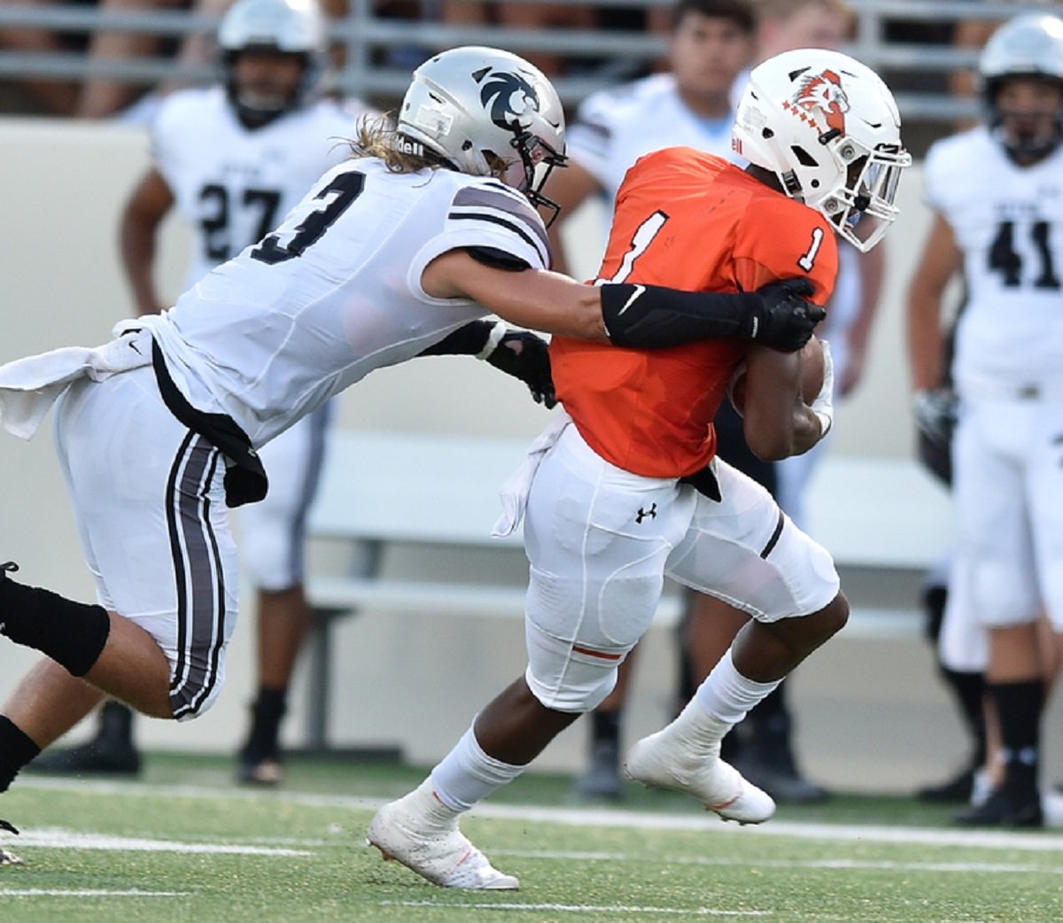 Aledo sophomore wide receiver Jo Jo Earle (1) catches one of his game-high eight passes Friday night during the Bearcats' 40-0 win over Denton Guyer Friday night at Collins Stadium. Earle caught a pair of touchdown passes (33, 25 yards) from quarterback Jake Bishop. Photo by Jeff Woo