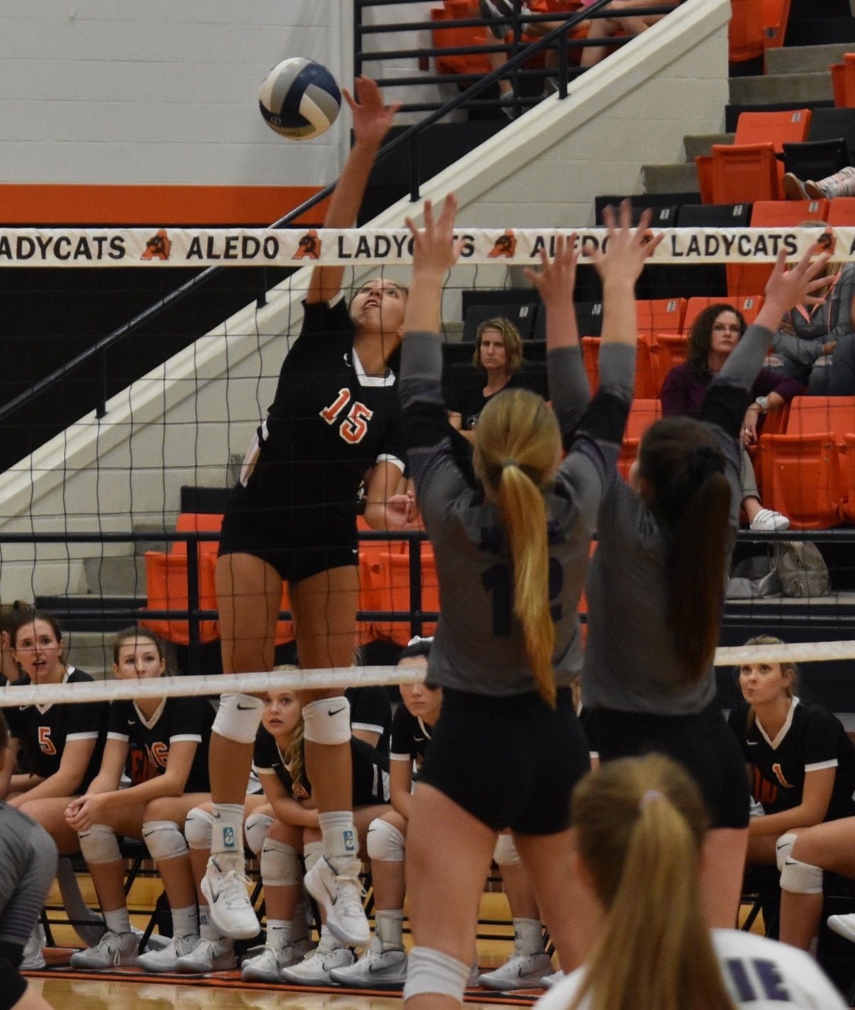 Aledo hitter Evelyn Torres sends down one of her match-high 12 kills during the Ladycats' sweep of Abilene Wylie in the District 4-5A volleyball opener Friday at the Aledo High School gym. Photo by Tony Eierdam
