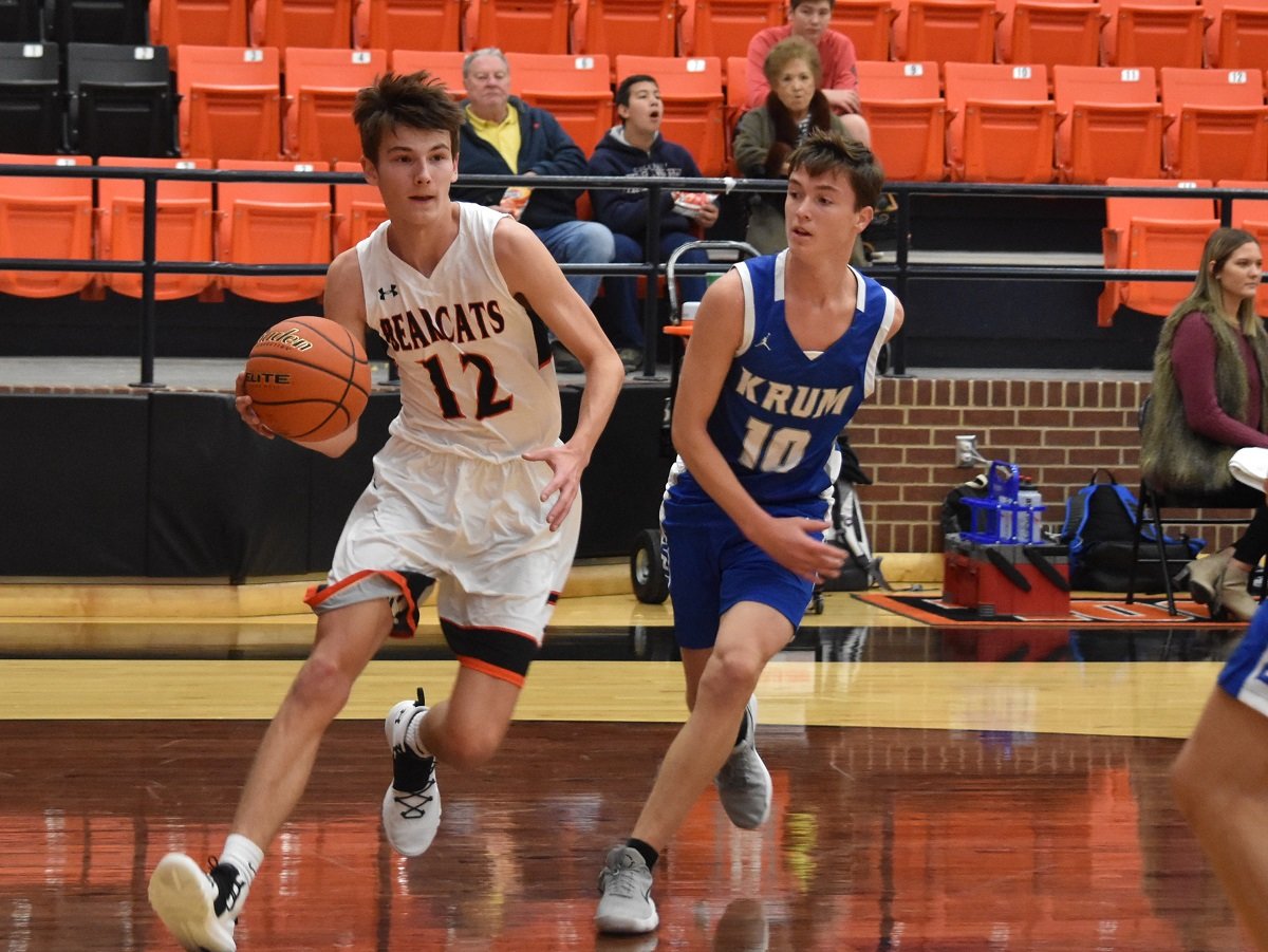 Aledo guard Max Newell drives to the basket during the Bearcats' loss to Krum Friday night at the AHS gym. Photo by Tony Eierdam