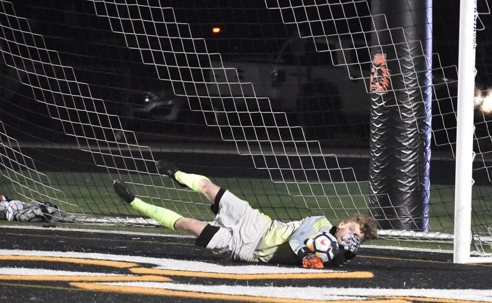 Aledo goalkeeper Ryland Yates dives to make a save during the Bearcats' 3-2 victory over Abilene Wylie. Photo by Tony Eierdam
