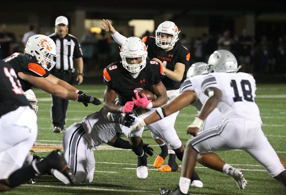 Aledo senior tailback Jase McClellan (9) scored five touchdowns, including four on the ground, during the Bearcats' 60-57 loss to Denton Guyer Friday night at Bearcat Stadium. Photo by Cynthia Llewellyn