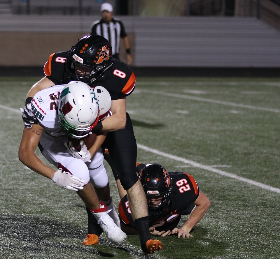 Aledo linebacker Max Lucas brings down a ball carrier during the Bearcats' 63-0 victory over the MX Dragons Friday night at Bearcat Stadium. Photo by Cynthia Llewellyn