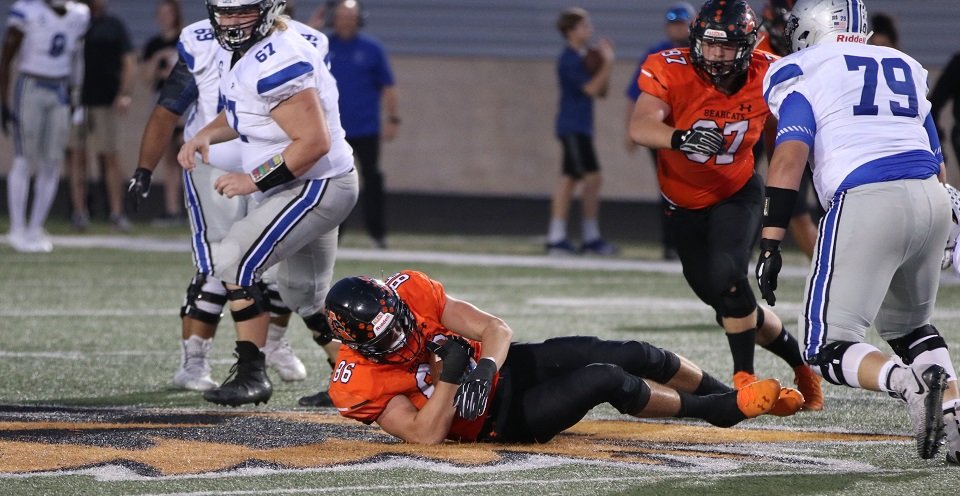 Aledo senior defensive end Logan Thurman (86) recovers a Burleson Centennial fumble during the first half of the Bearcats' 63-30 victory over the Spartans Friday night in the District 5-5A opener at Bearcat Stadium. Photo by Cynthia Llewellyn
