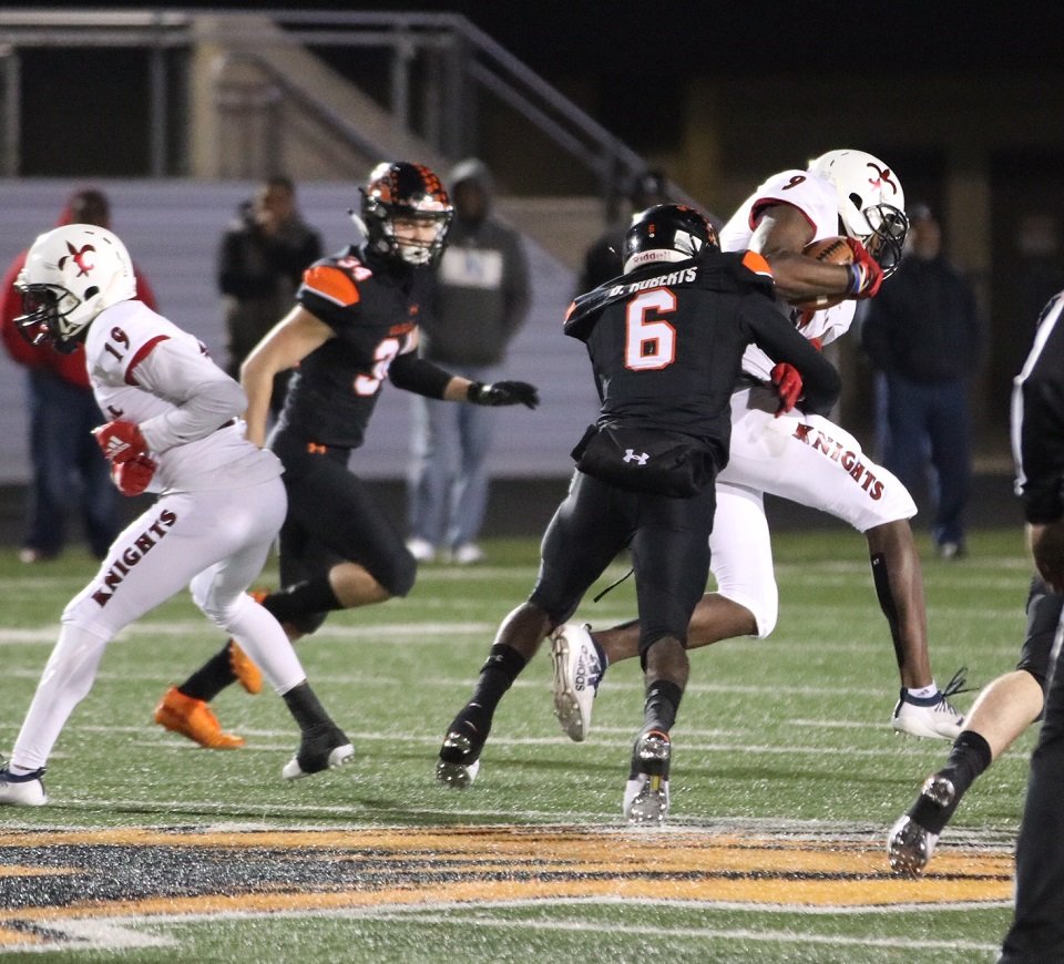 Aledo senior cornerback DeMarco Roberts (6) records a tackle during the Bearcats win over Dallas Kimball. Roberts intercepted a pass and blocked a field goal and returned the ball for a touchdown during the playoff win. Photo by Cynthia Llewellyn