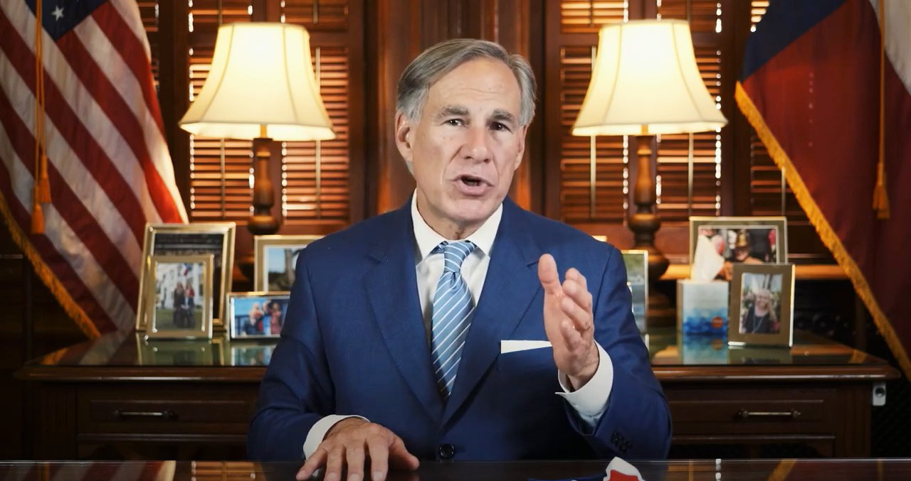 Gov. Greg Abbott is shown during the announcement mandating masks in counties with more than 20 cases.