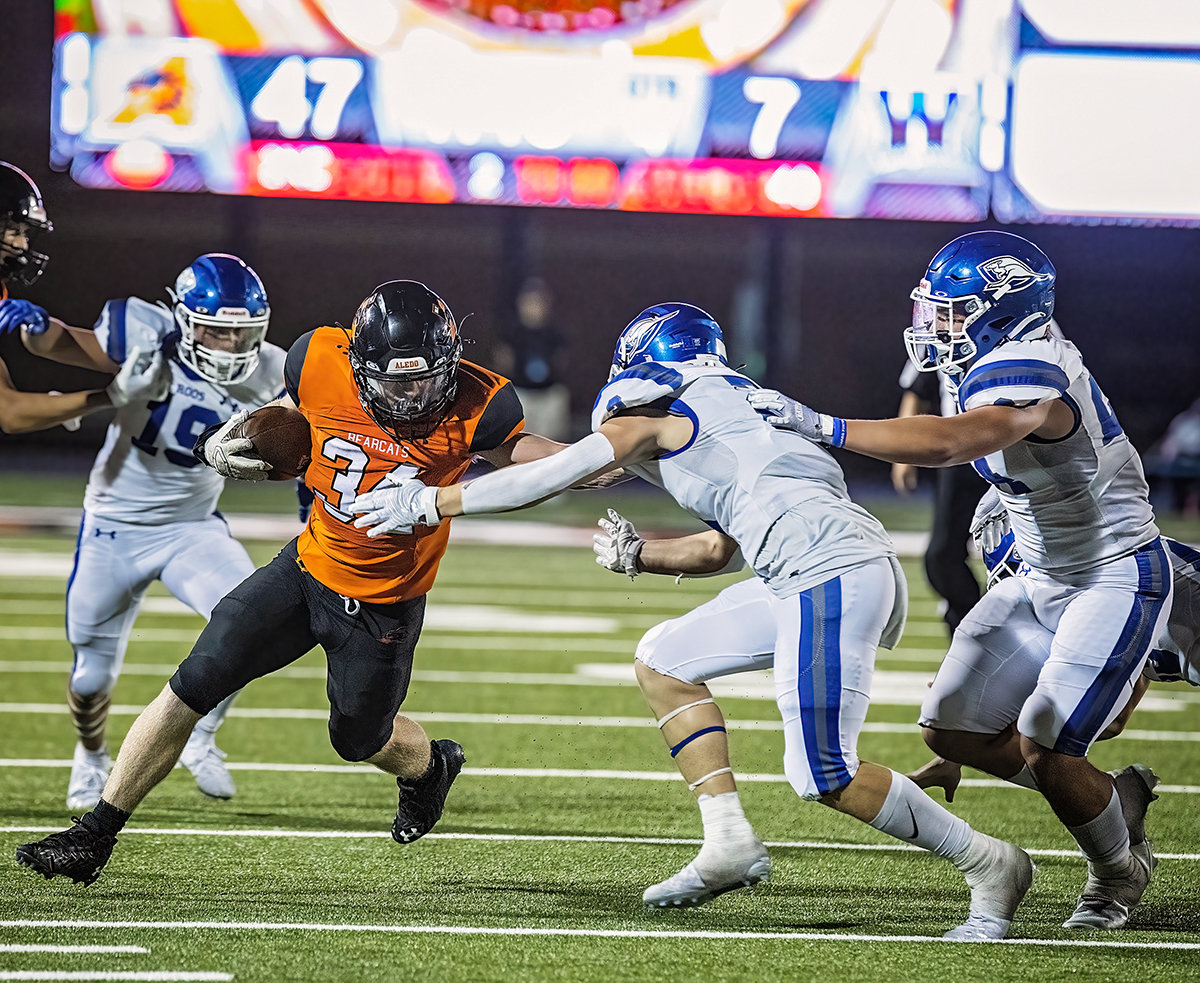 Senior running back Connor Smith (34) scored Aledo's final two touchdowns in the fourth quarter against Weatherford on Friday night. Photo by Kristin Morales.