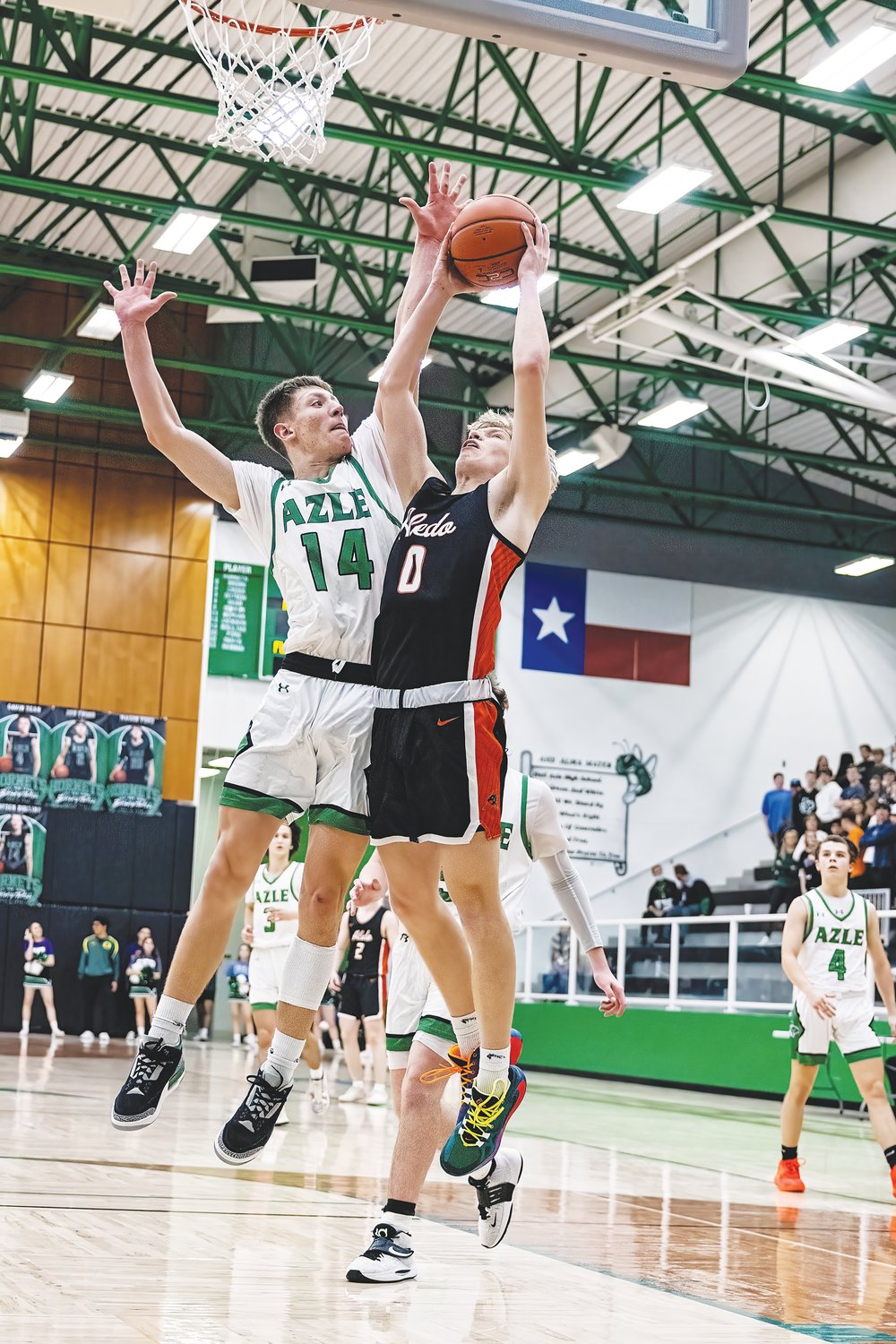 Drew Clock goes to the basket against Azle. Clock had 21 points in the game.
