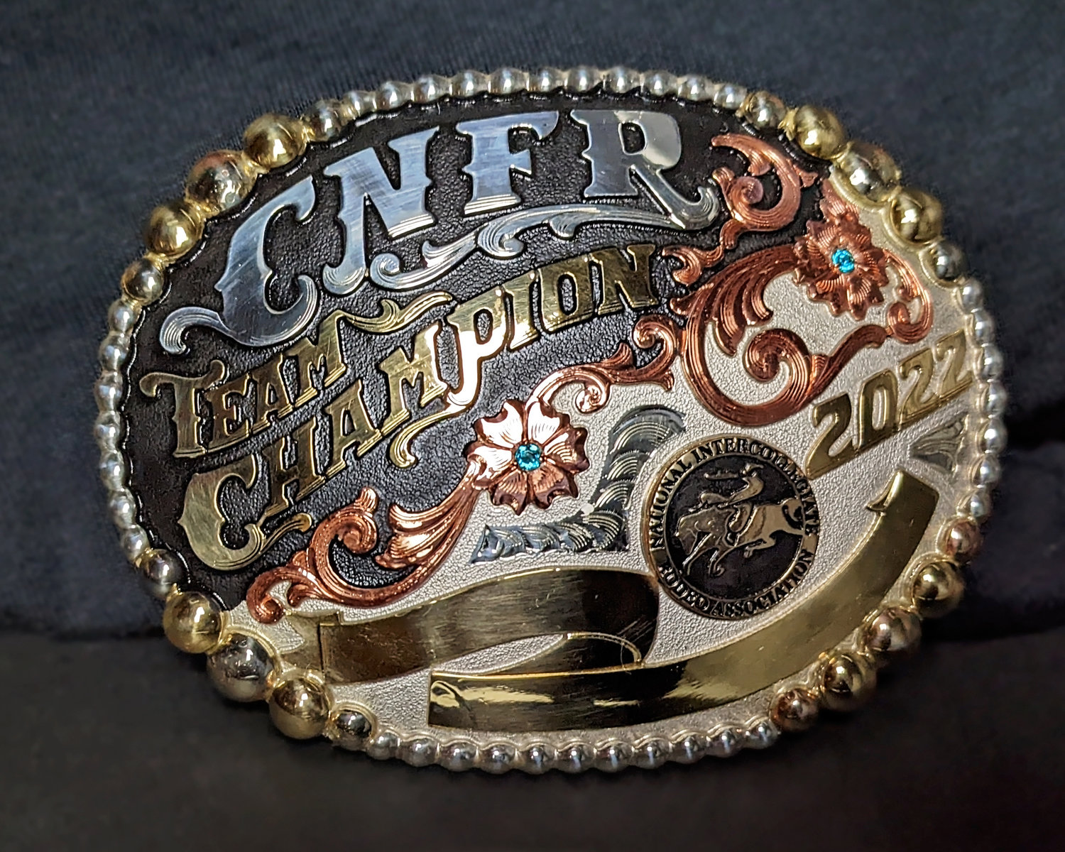 The College National Finals Rodeo belt buckle for the Weatherford College championship