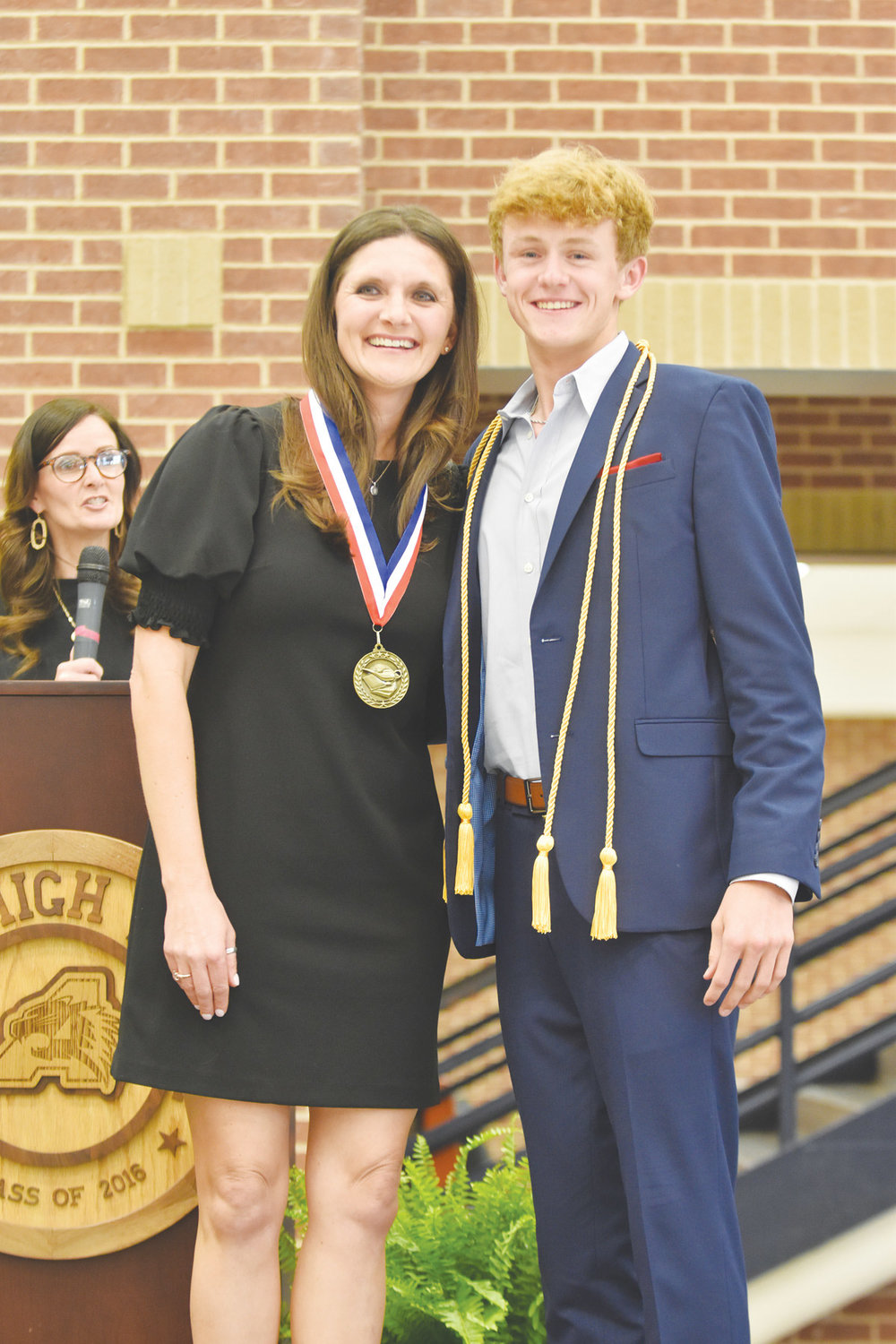 Jace Sims is the son of Trey and Brooke Sims. Jace plans to attend Texas A&M University and major in business finance in hopes to own his own business one day. He honored Mrs. Jamie Rinehart.