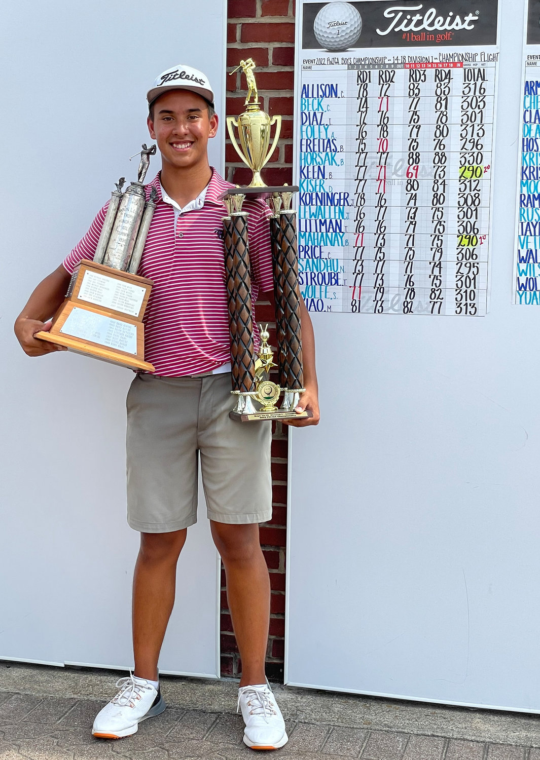 Aledo's Braylon Mahaney holds two trophies after winning the Fort Worth Boys Junior Golf Championship. The one on the right is for winning this year's tournament and the one on the left has the names of every winner since the tournament started in 1936.