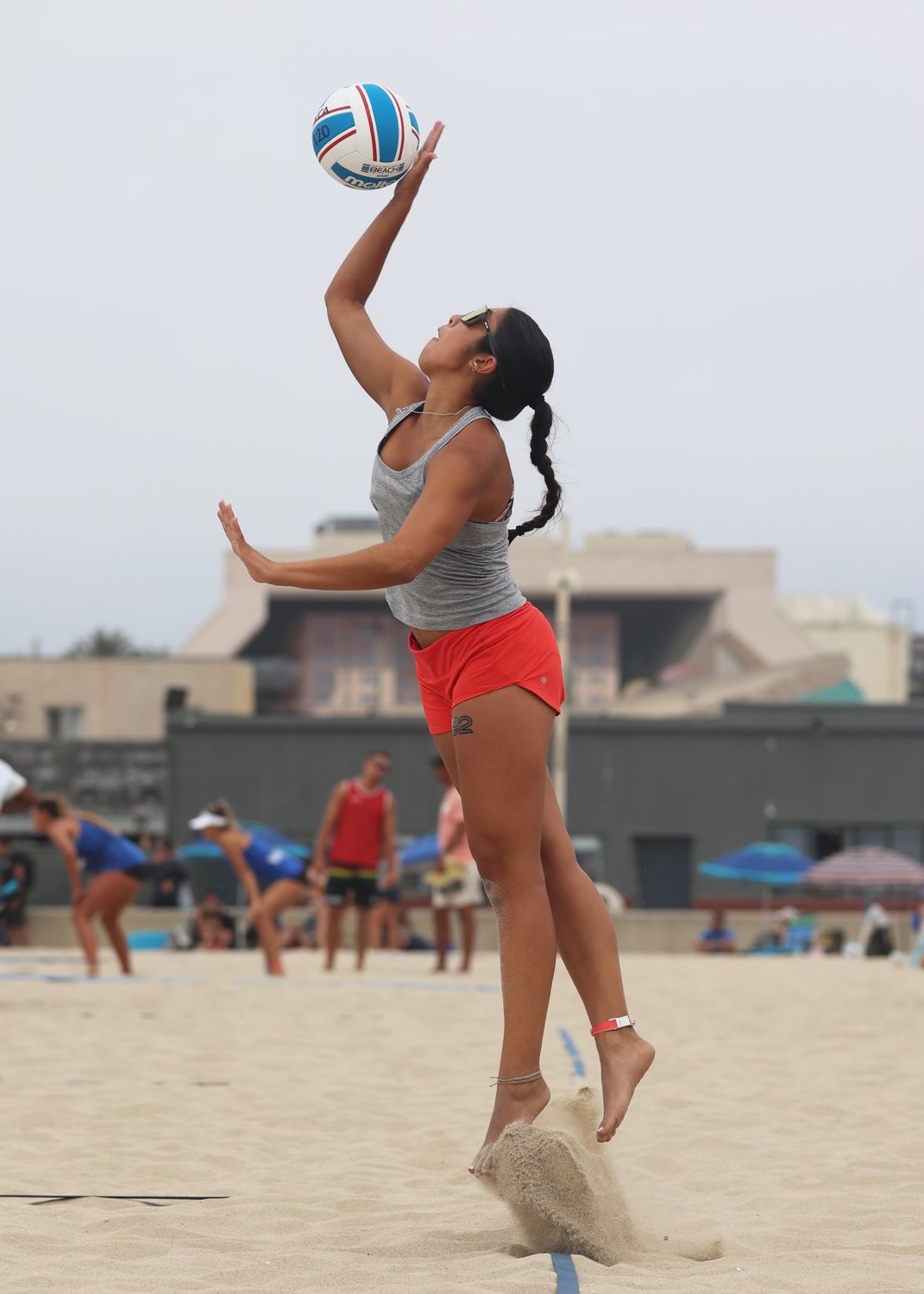 Bella Sigala in sand volleyball action