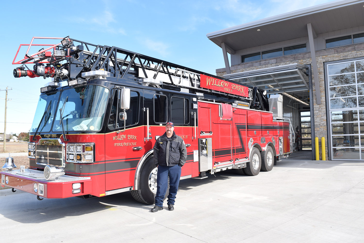 Willow Park's Ladder Truck is shown with former Fire Chief Mike Lenoir when the city's Public Safety Building opened in 2019.