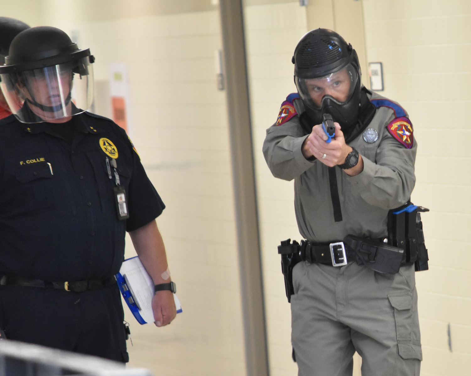 Aledo ISD Police Officer Cliff Boltwood works through a scenario with coaching by Aledo ISD Police CHief Fred Collie.