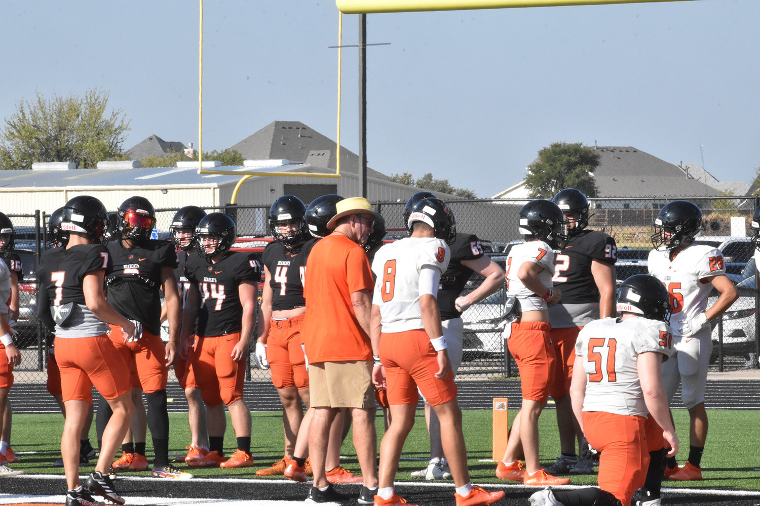 Aledo Head Coach Tim Buchanan works with players during the Bearcats' Intra-Squad Scrimmage on Saturday, Aug. 13.