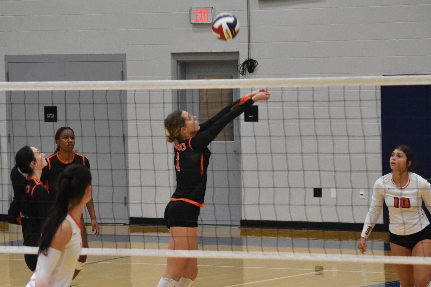 Maddie Frank bumps the ball against Rockwall