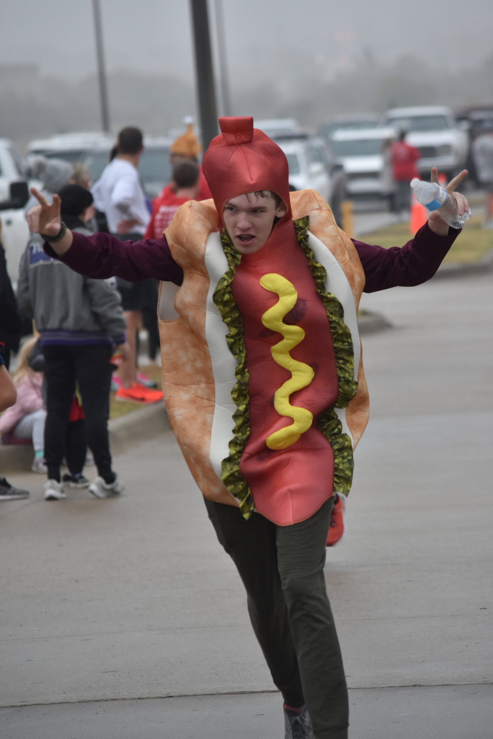 Hot dog! Noah Kieta finishes the race in costume.