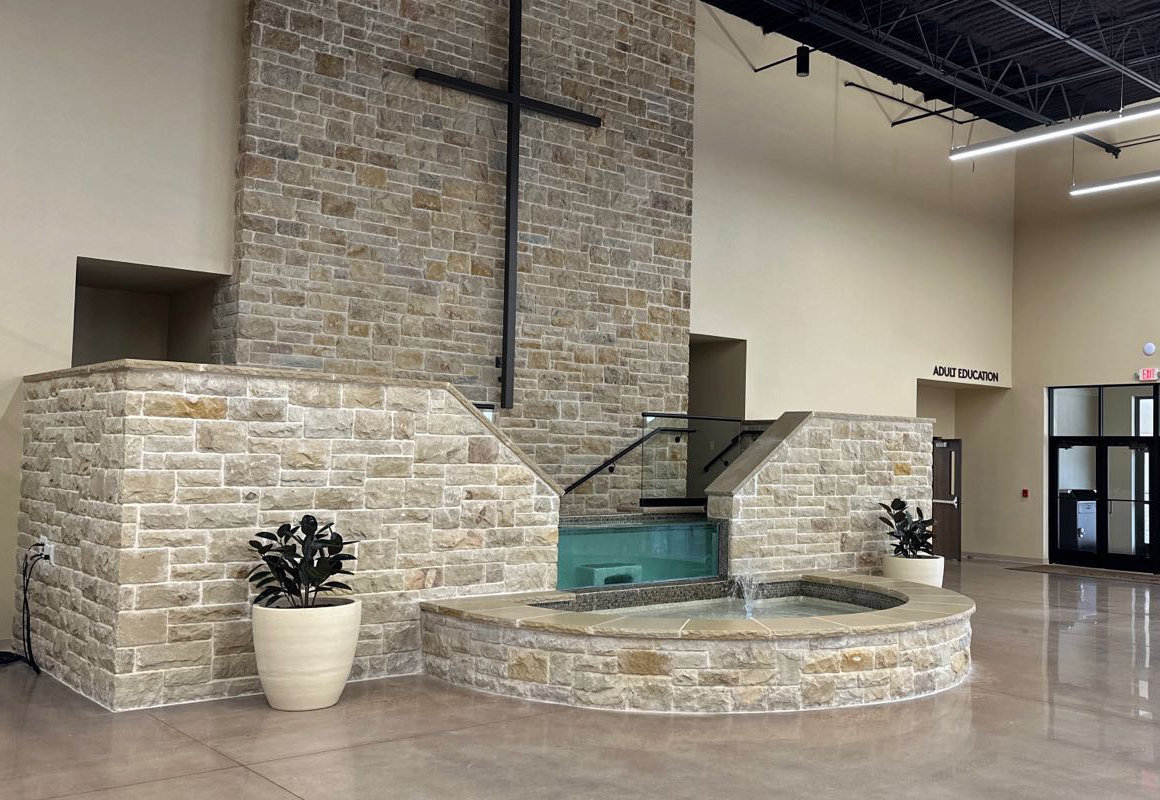 The baptistry is located in the atrium, which is large enough to accommodate the full congregation, although baptisms can also be viewed on the big screen in the sanctuary.
