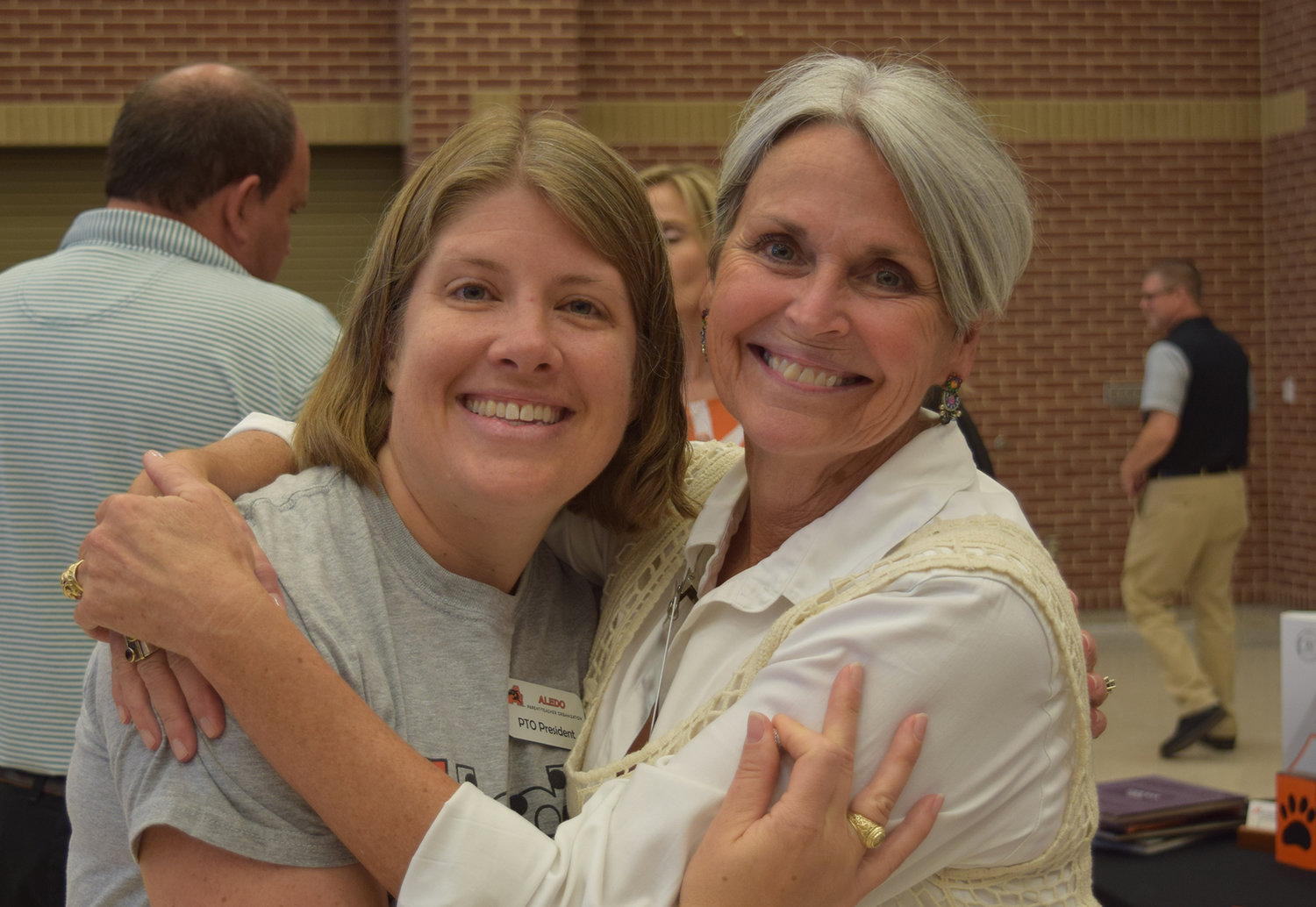 Aledo Class of 1995 alum Candace Lear with Deputy Superintendent Lynn McKinney at Bearcat Nation 101 in 2019. McKinney was high school principal during Lear's years at AHS.