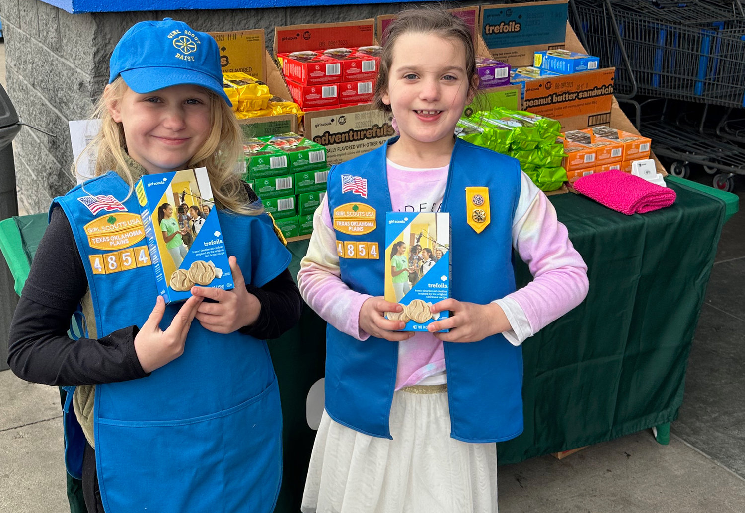 McKenzie May, first-grader at Coder Elementary School and Stella Price, first-grader at Southwest Christian School, approached the end of Girl Scout Cookie sales at Wal-Mart in Hudson Oaks. Both girls are part of the new Daisy Girl Scout Troop #4854 that just started in January. The troop sold a told of 6,108 boxes and will donate a large number of boxes to first responders as a result of so many donations given at their booths.