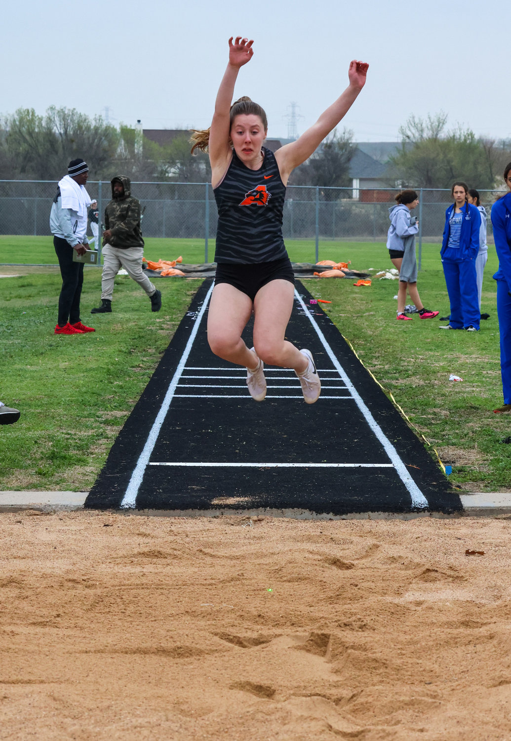 Trinity Hindman goes for distance in the long jump.