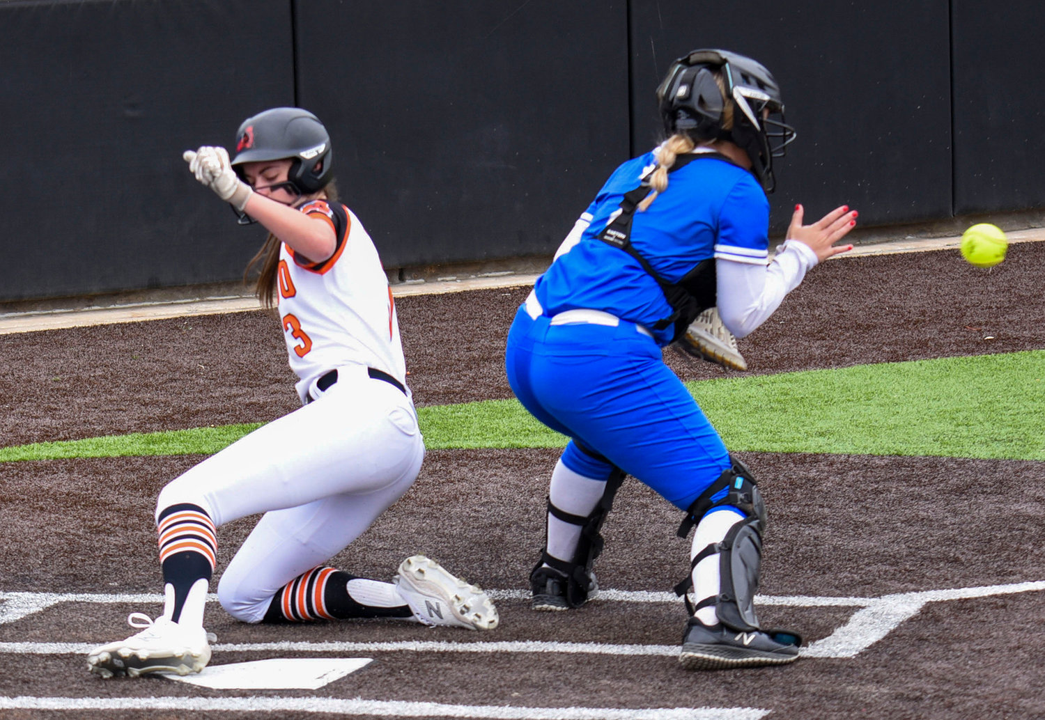 Reagan Davis slides safe into home plate March 15 during the Ladycats vs Brewer Bears game.