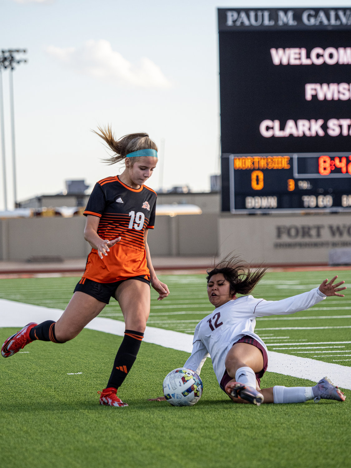 Saddie Smith works around a sliding Northside defender in the Ladycats 6-0 rout over Northside in a grueling bi-district match.