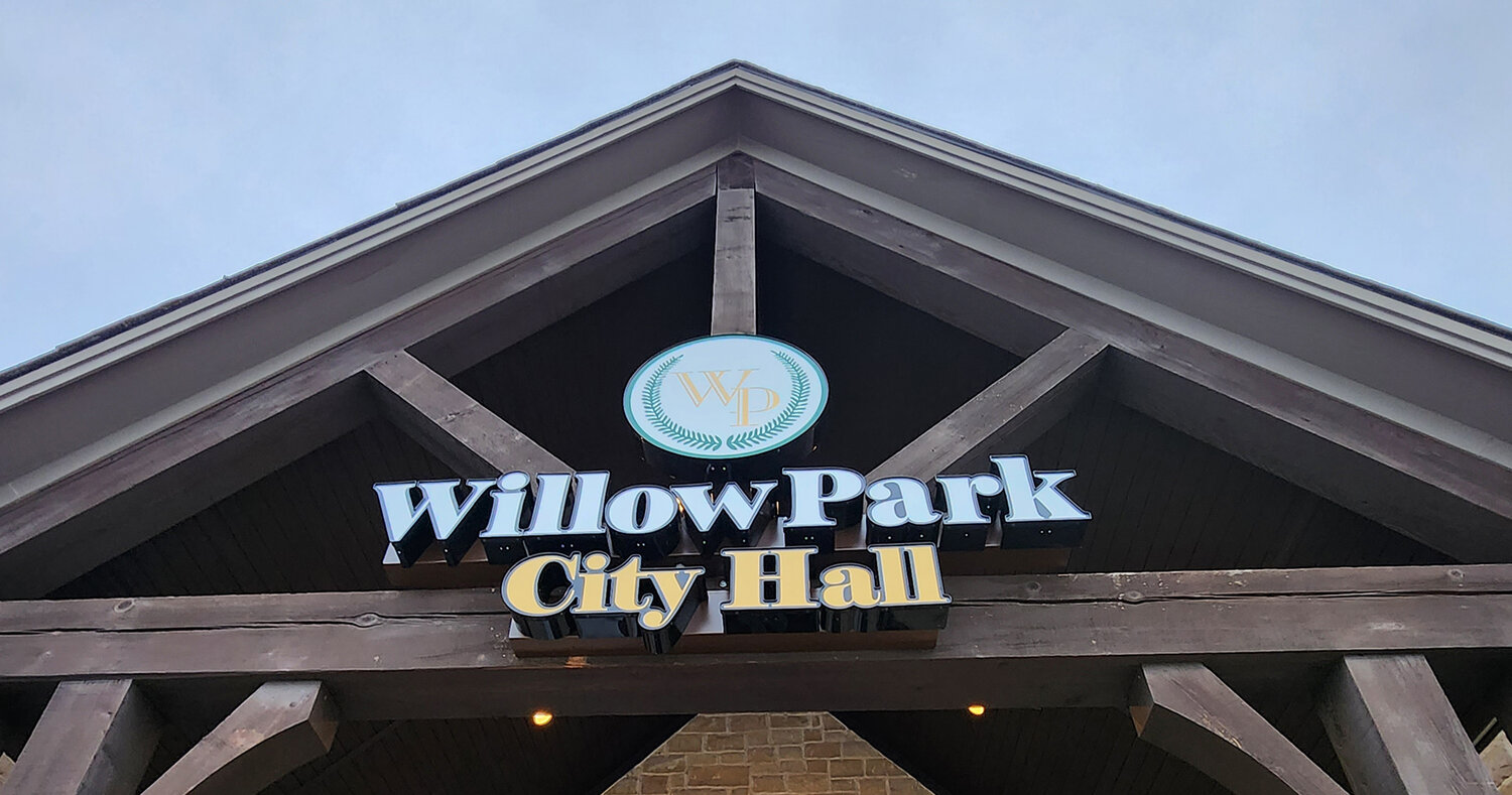 The new sign above the entrance to Willow Park City Hall at 120 El Chico Tr. City staff moved into their new home in January.