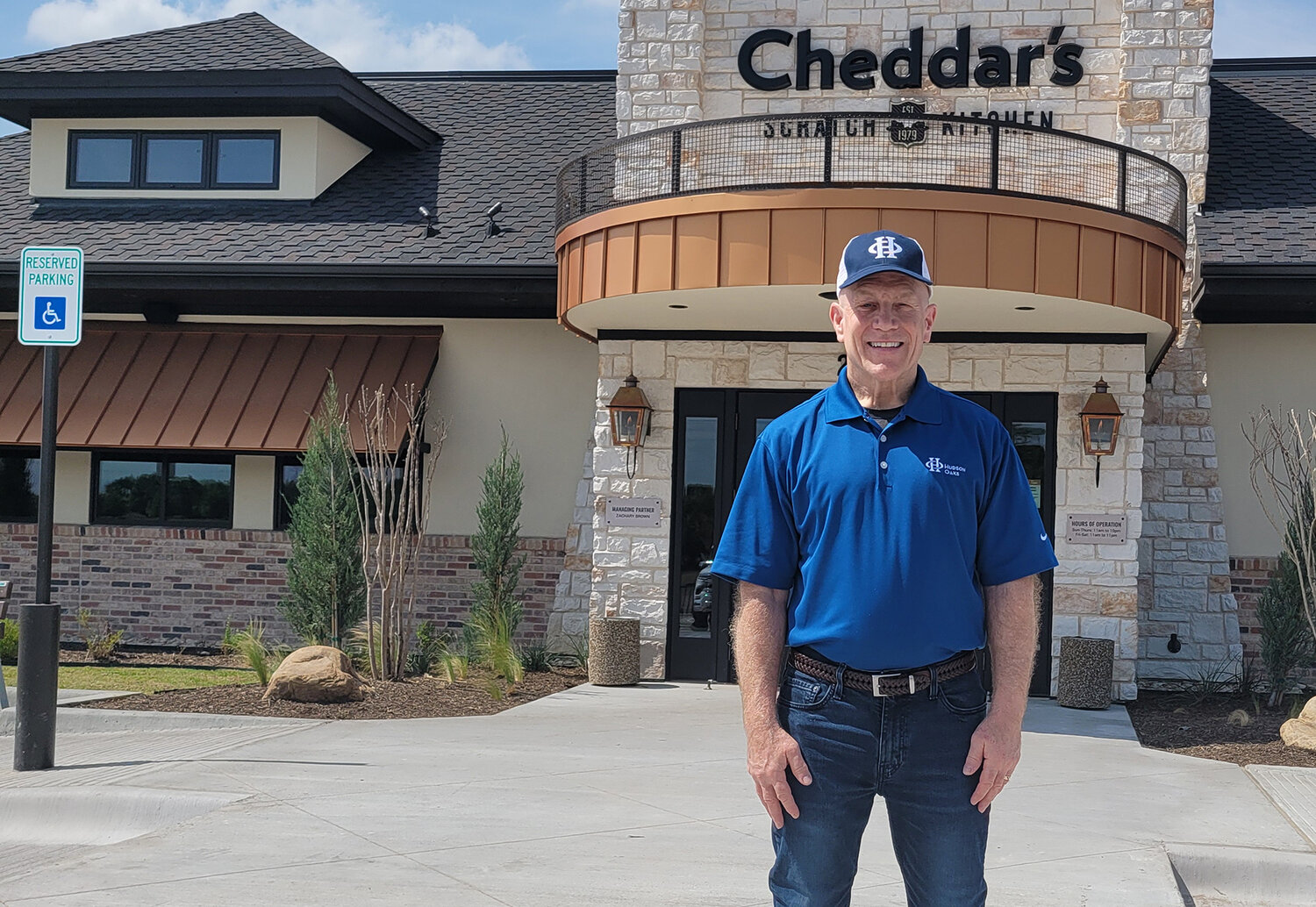 Hudson Oaks Mayor Tom Fitzpatrick stands in front of the new Cheddar's restaurant, one of many businesses that are finding their way to this small Parker County city.