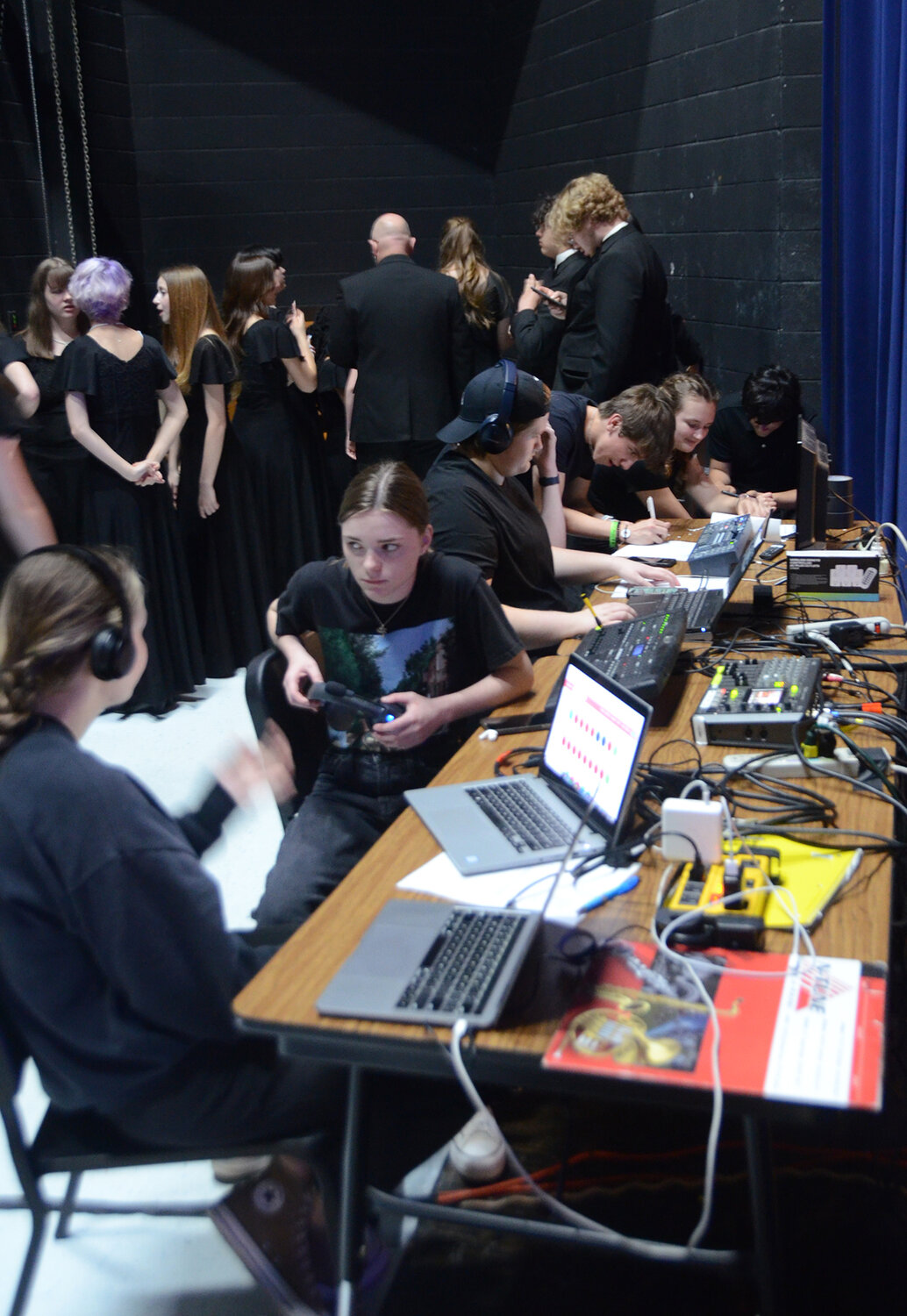 Student technicians backstage prepare for the Night at the Pops experience.