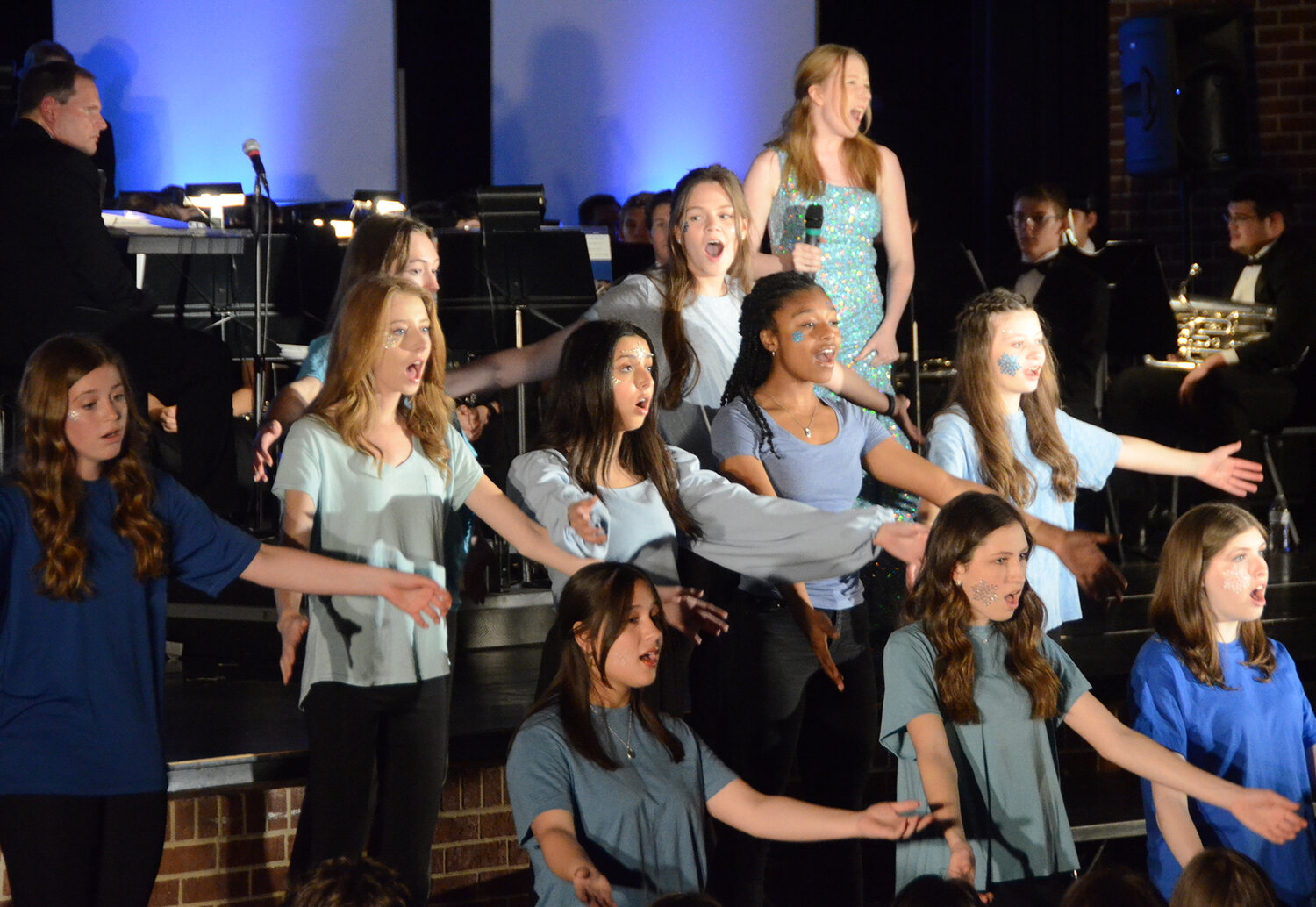 Choir members added vocals to the performance.