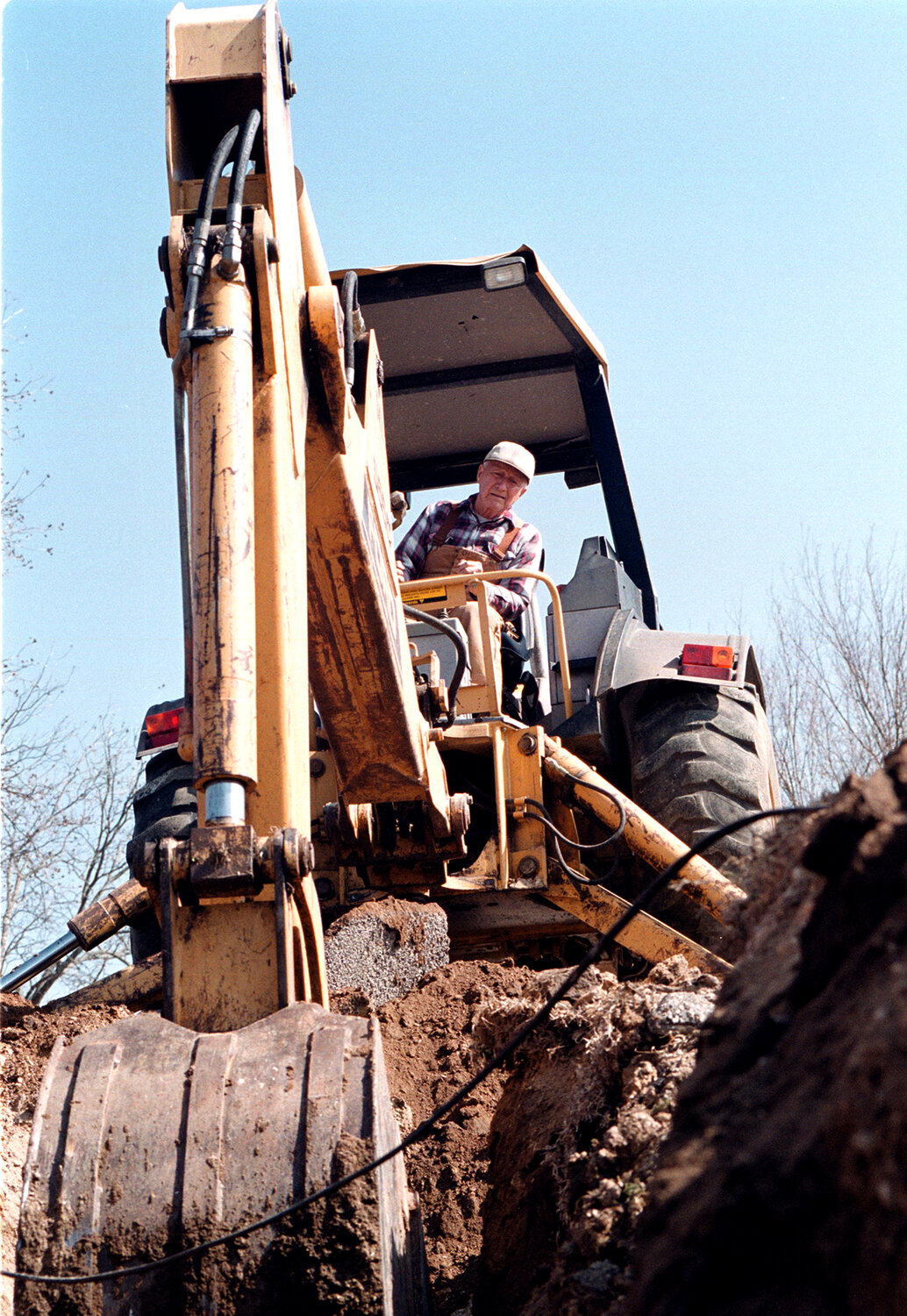 When Aledo United Methodist Church began the project of expanding its sanctuary, Pecan Street had to be re-routed. Church member Charlie McLane dug the trenches to move gas supply lines.