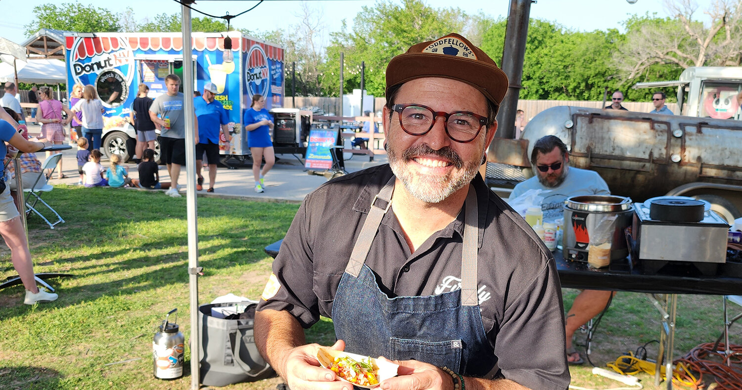 John Wayne of Firefly Grilling Company gave out samples and smiles at the annual Taste of Parker County on April 18. The annual event raises funds for the Weatherford College Foundation.