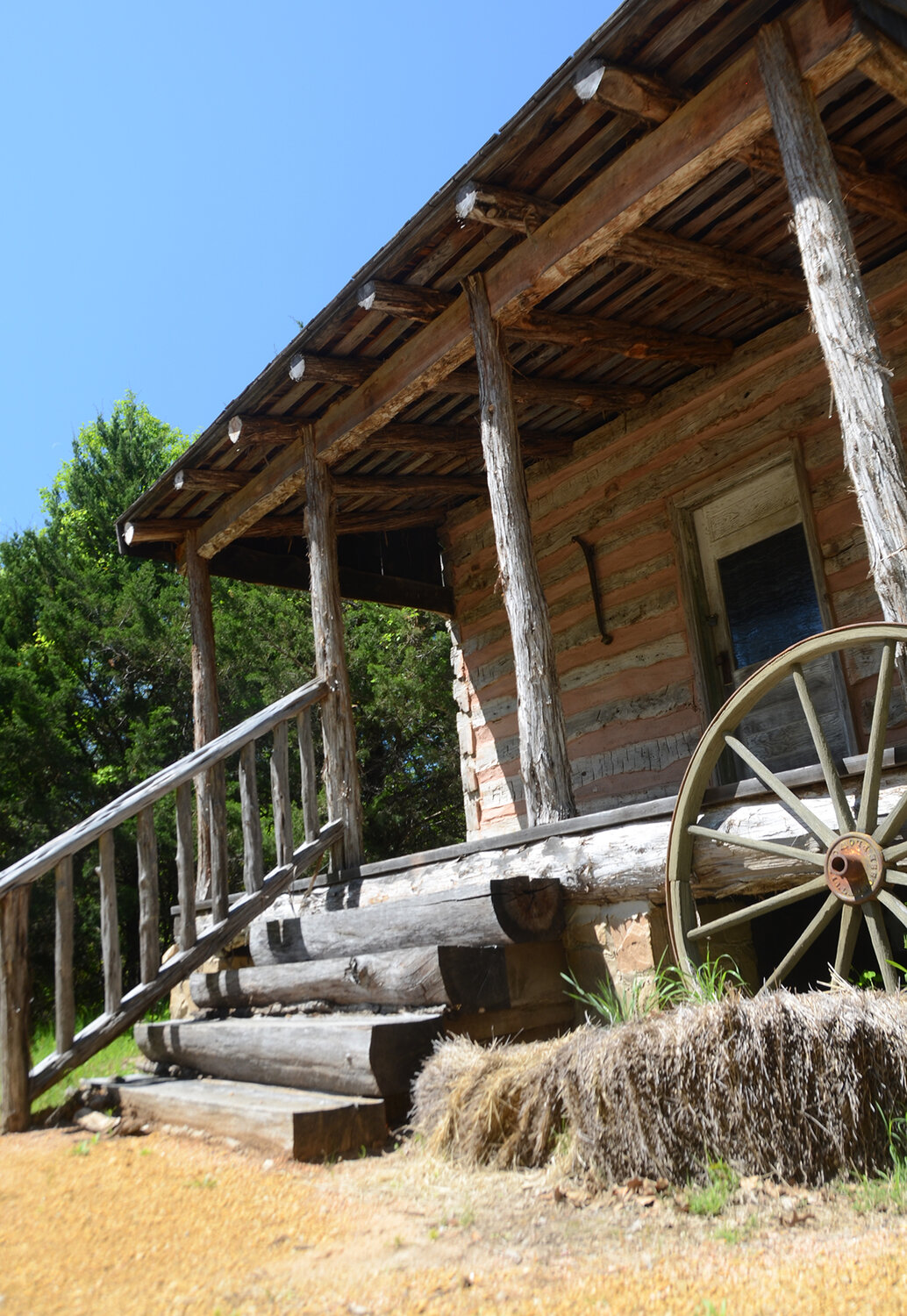 Visitors to the Log Cabin Park can explore historic structures such as this one at the Doss Heritage and Culture Center.